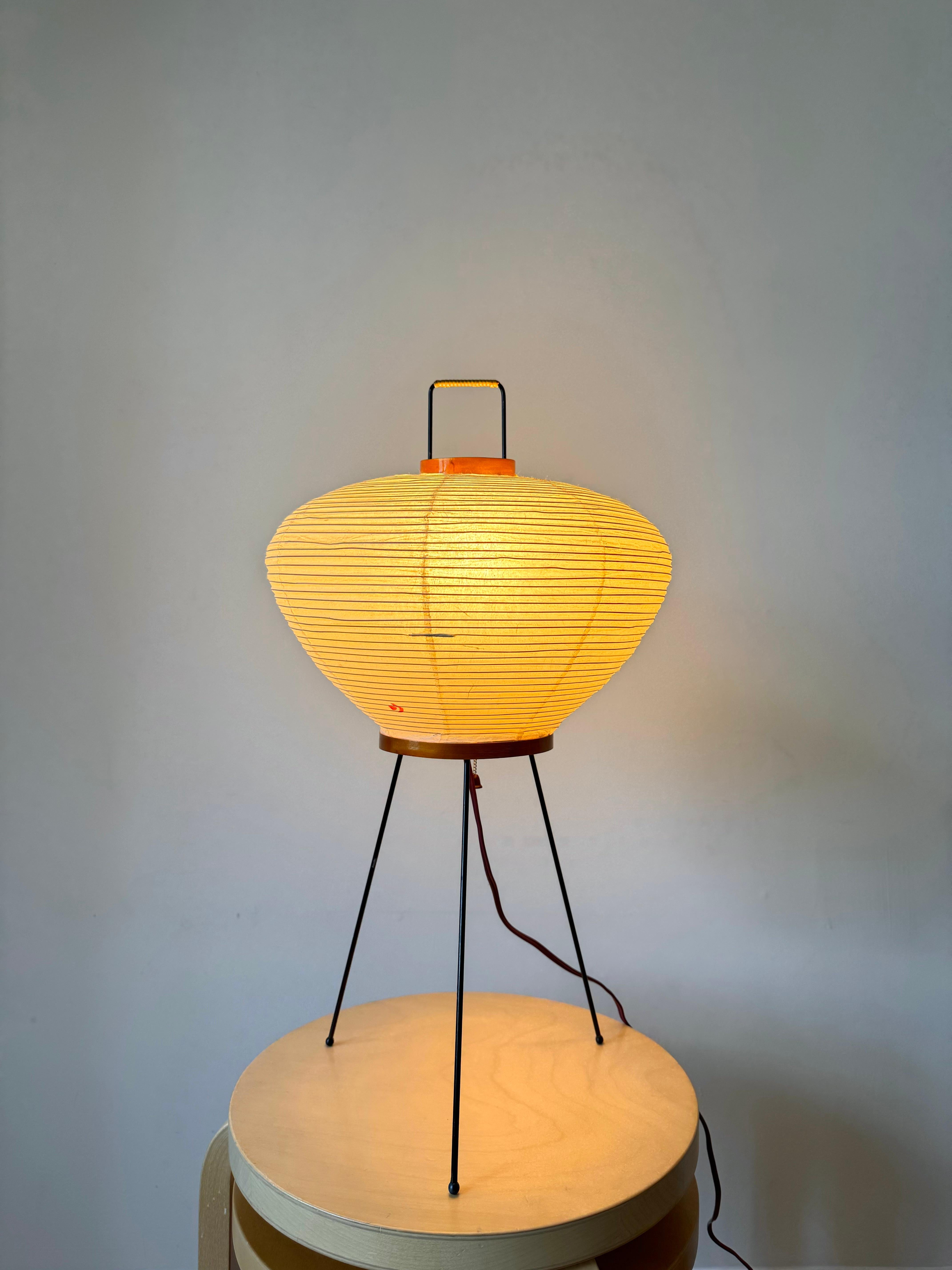 Akari Light Sculptures by Isamu Noguchi are considered icons of 1950s modern design. Designed by Noguchi beginning in 1951 and handmade for a half century by the original manufacturer in Gifu, Japan, the paper lanterns are a harmonious blend of