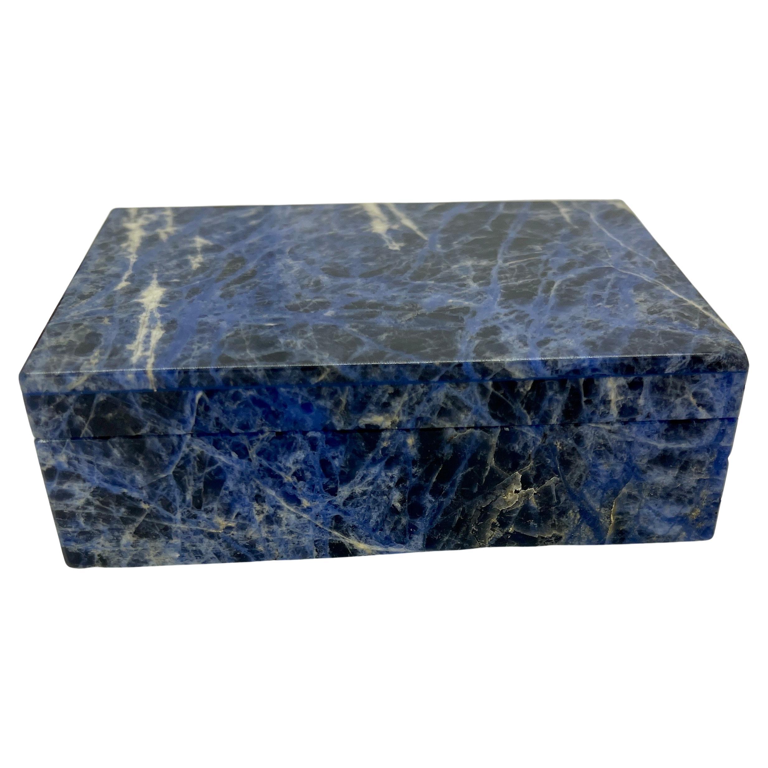 Early Arezzo, Italy jewelry or cigarette box in Sodalite and translucent marble. 
The rectangular box has high quality gilt silver hardware that is strongly marked 