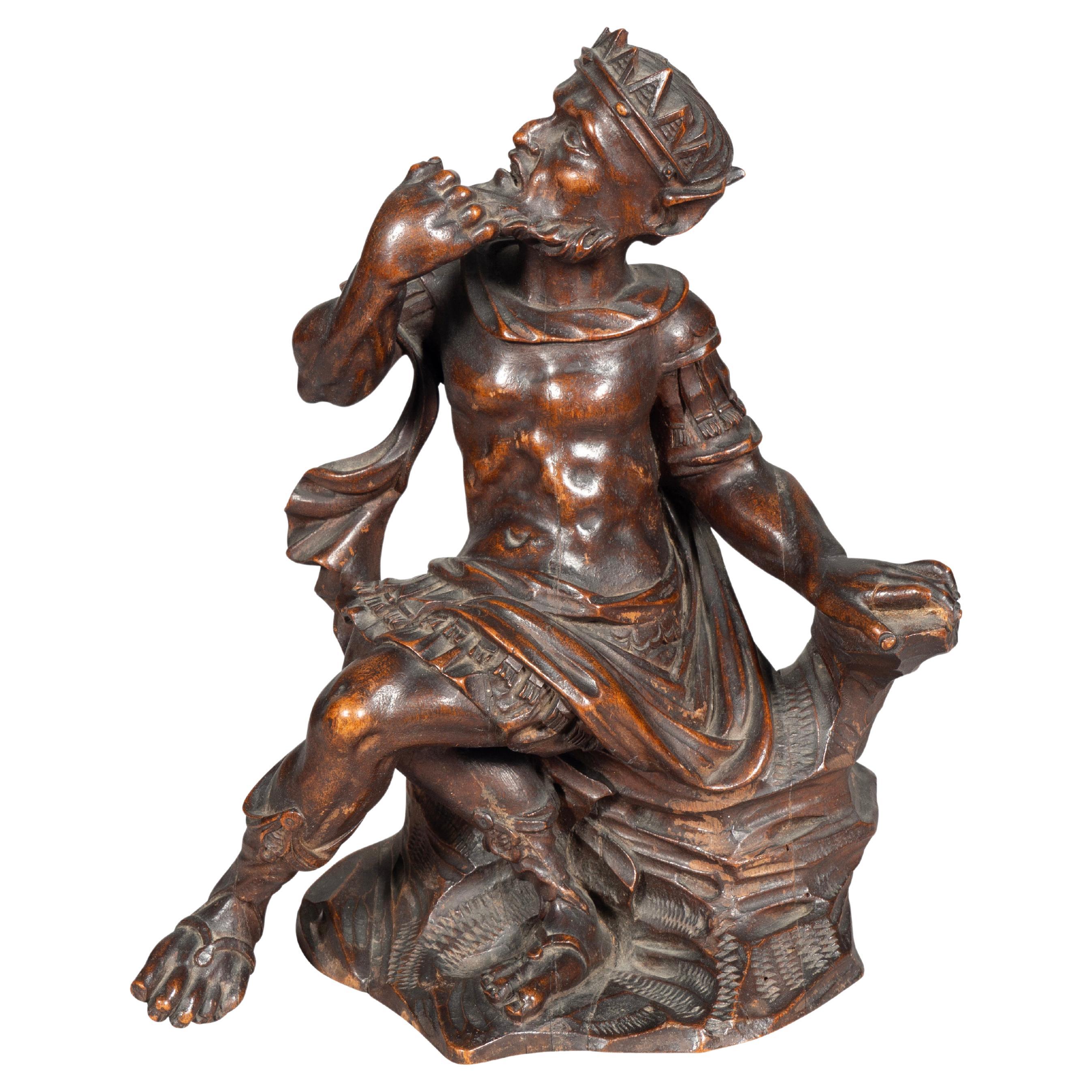 Figure sculptée italienne ancienne d'un roi assis en vente
