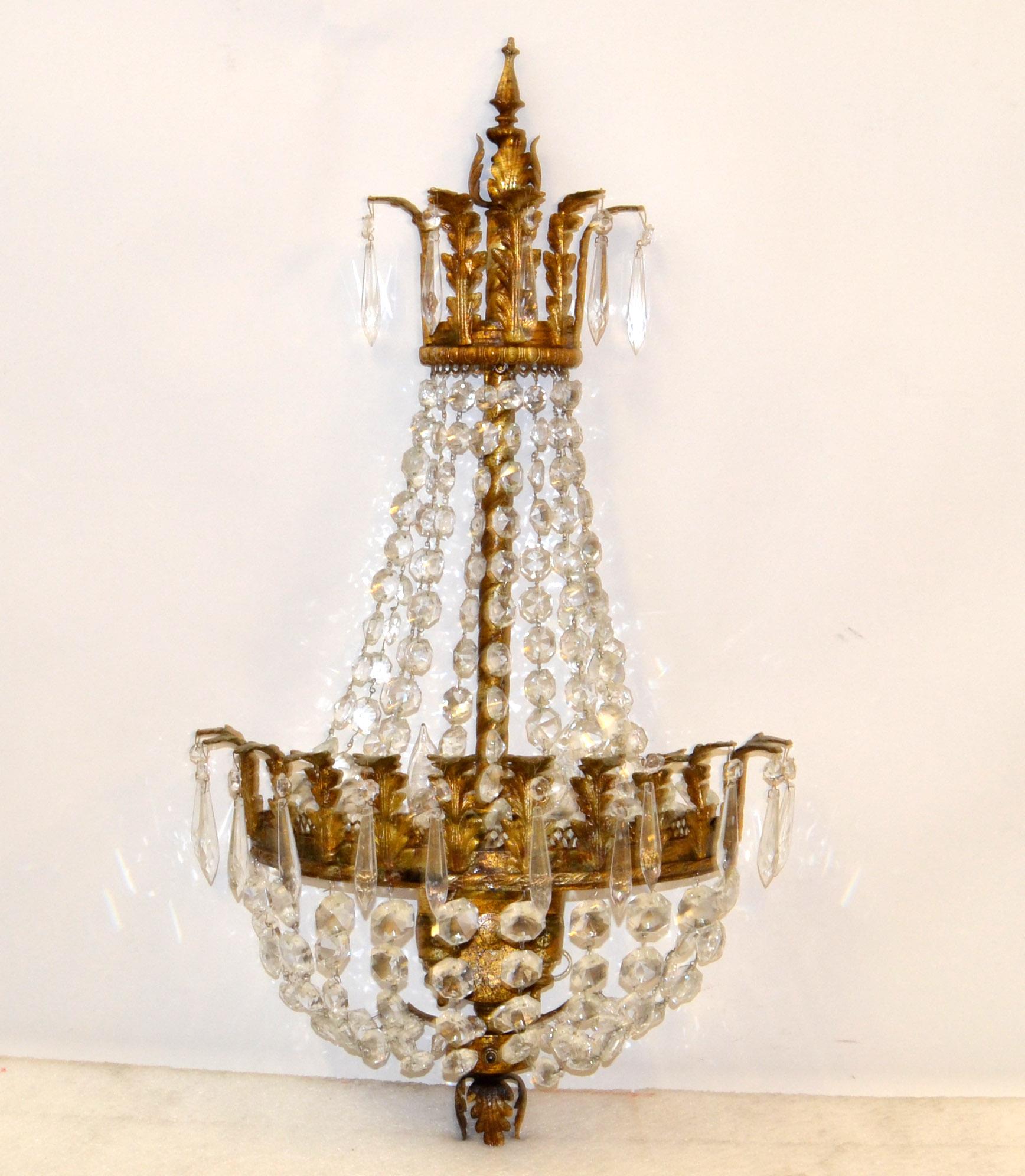 Italian Empire Style early half circle Gilt Metal, Bronze and Crystal Sconce, Wall Light with 2 Light sockets in the globe center. 
US Rewiring and takes 2 candelabra light bulbs max. 40 watts / 120V.
In fully restored condition and ready for