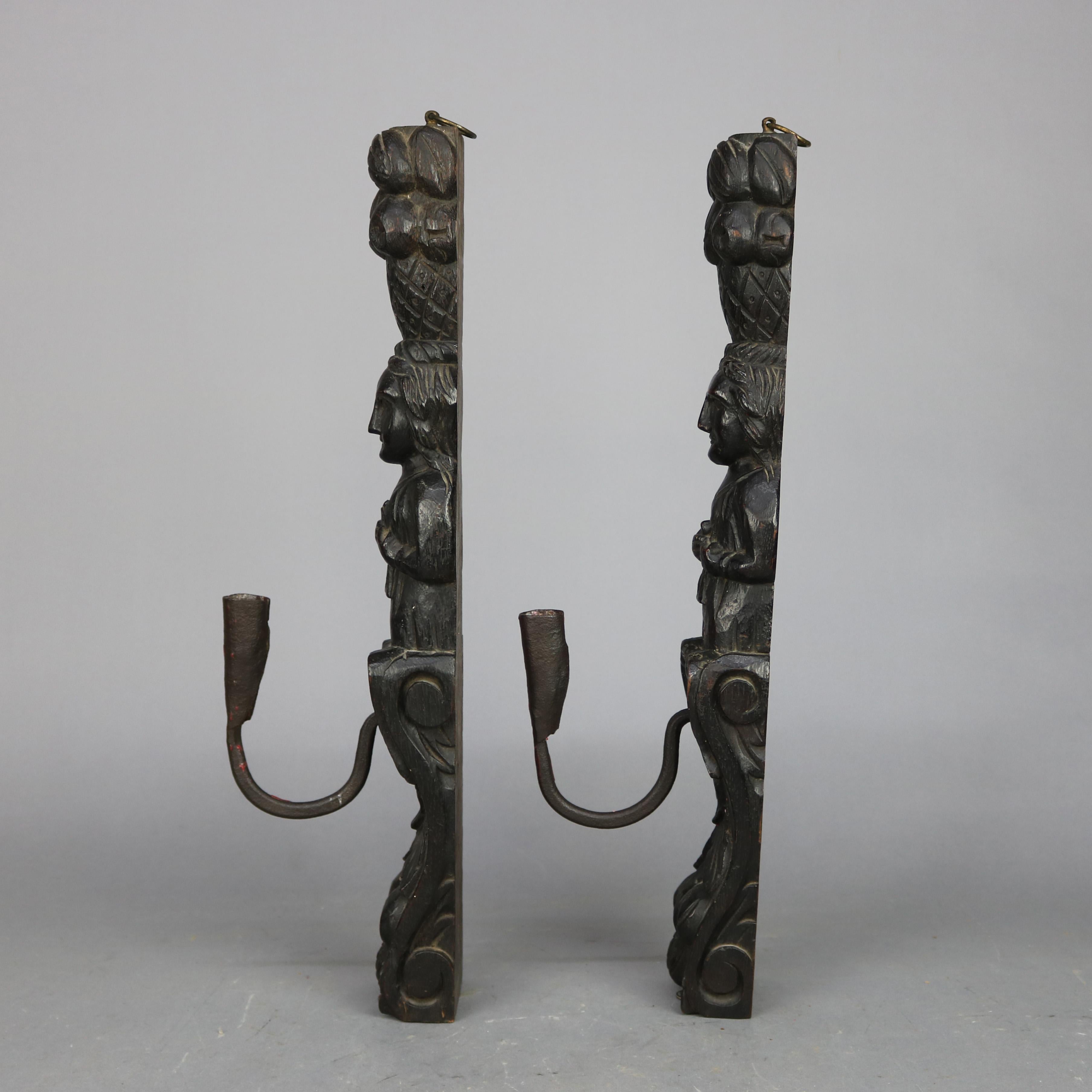 18th Century and Earlier Early Jacobean Tudor Figural Carved Oak & Handwrought Iron Wall Sconces