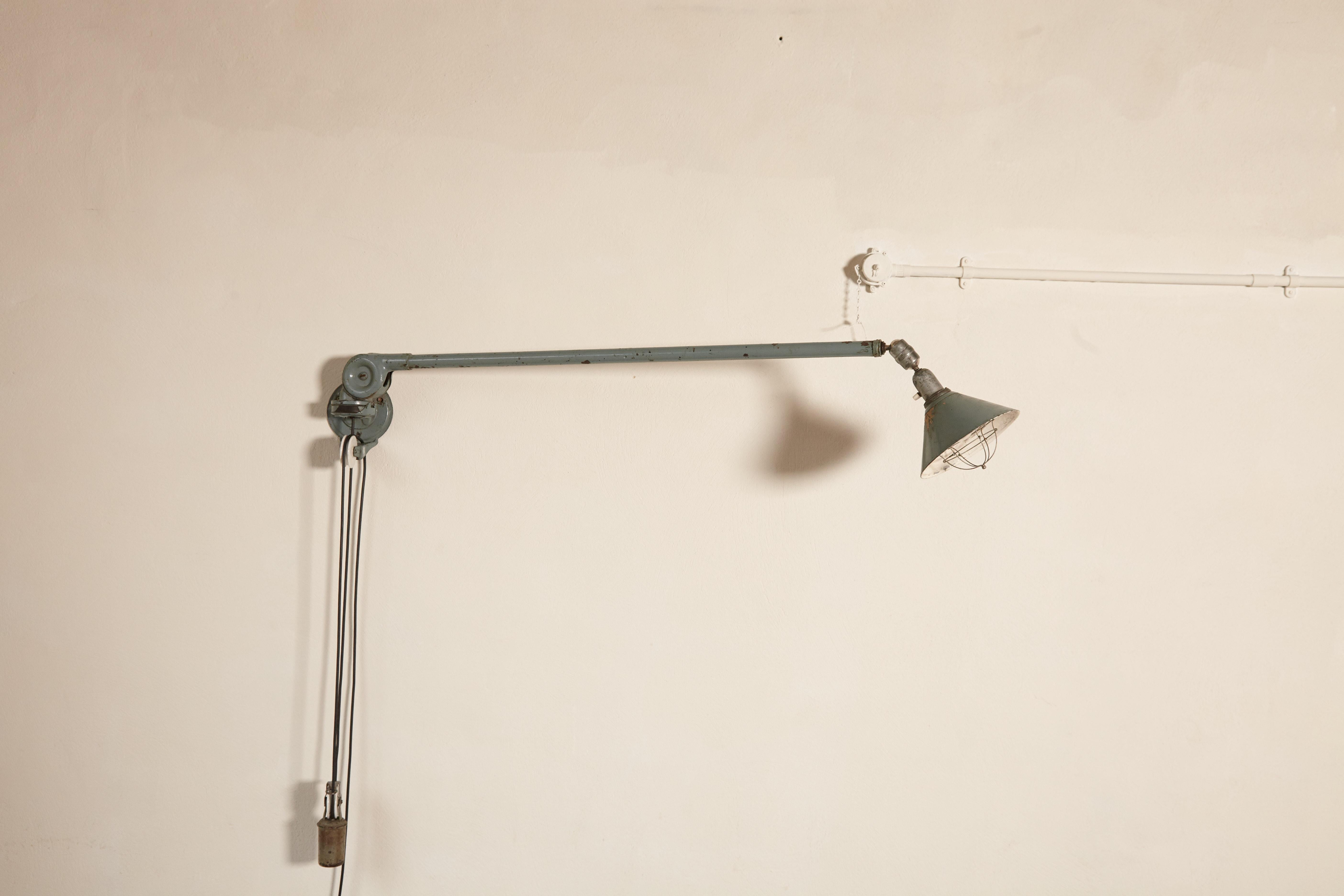 A rare early Johan Petter Johansson Industrial triplex telescopic lamp, with counterweight, Sweden, circa 1910s. Can be wall, floor or ceiling hung. Extends up to 300cm. Adjustable in many directions. Nice original condition - with some marks, paint
