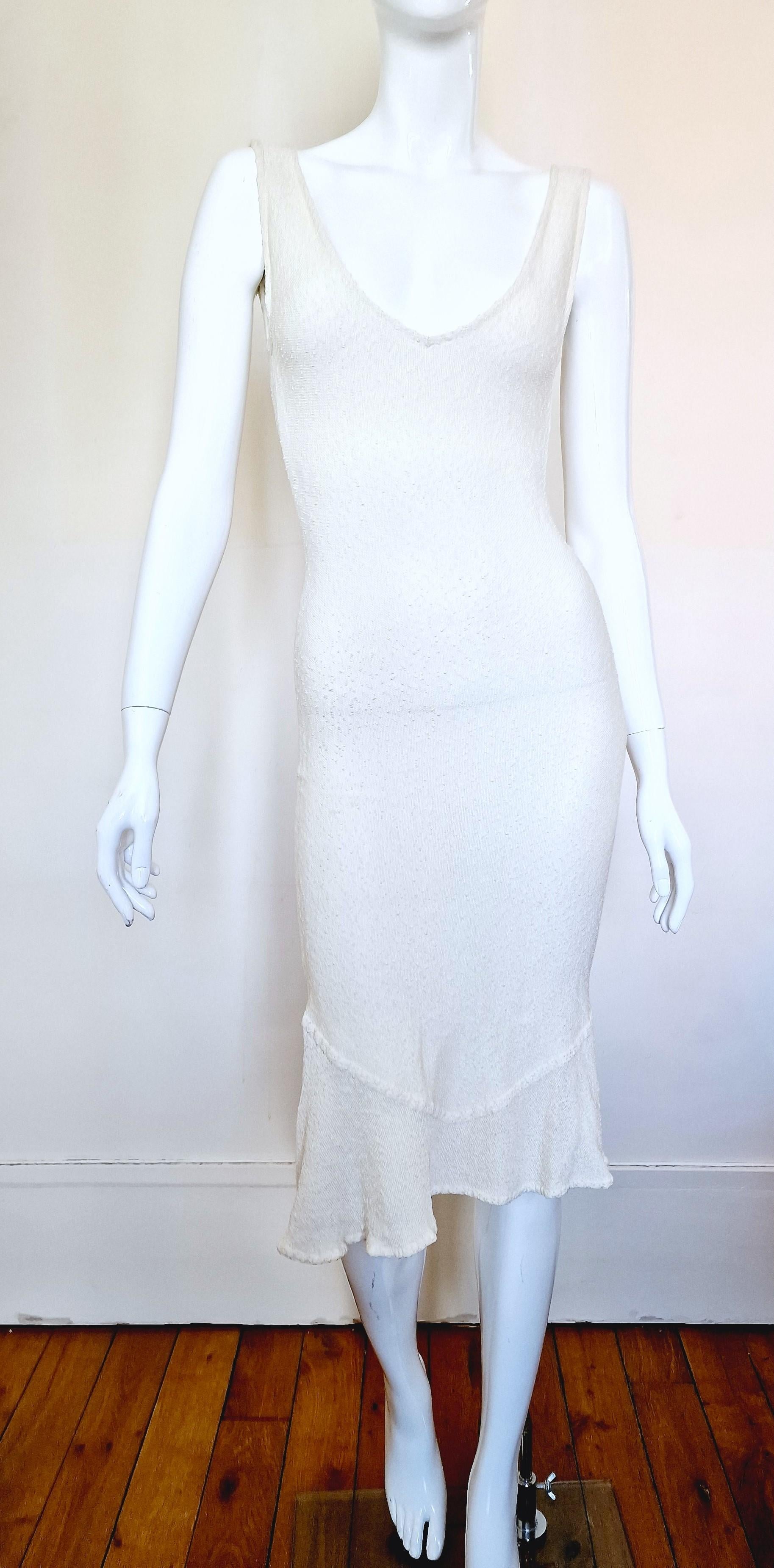 Early beautiful piece by John Galliano!
Wonderful silhouette!

LIKE NEW!

SIZE
Fits from XS to small.
Marked size: small.
Length: 104 cm / 40.9 inch
Bust: 35 cm / 13.8 inch
Waist: 30 cm / 11.8 inch
Hips: 36 cm / 14.2 inch

Made in France!
88%
