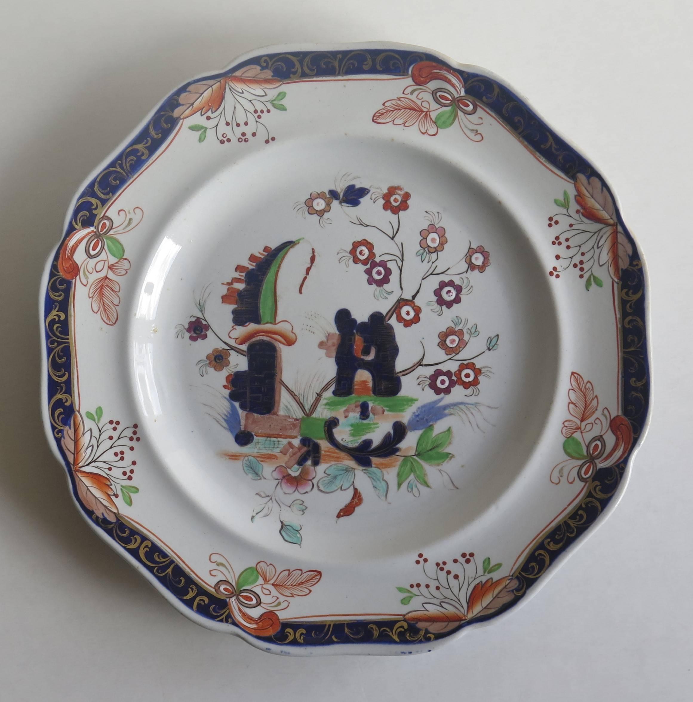 This is a highly decorative English Plate made of Imperial Stone China (ironstone), and manufactured by John Ridgway, dating to the William IV period of the 19th century, circa 1835. 

This plate has been carefully hand painted in bold colorful