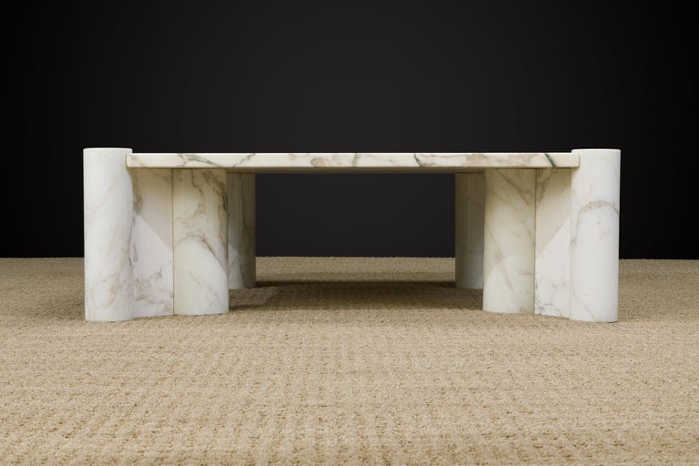 This pièce de résistance is considered the holy grail of 'Jumbo' cocktail tables due to the rare golden Calacatta marble which features dramatic veins in golds and greys. The 'Jumbo' table is already extremely sought after and original early