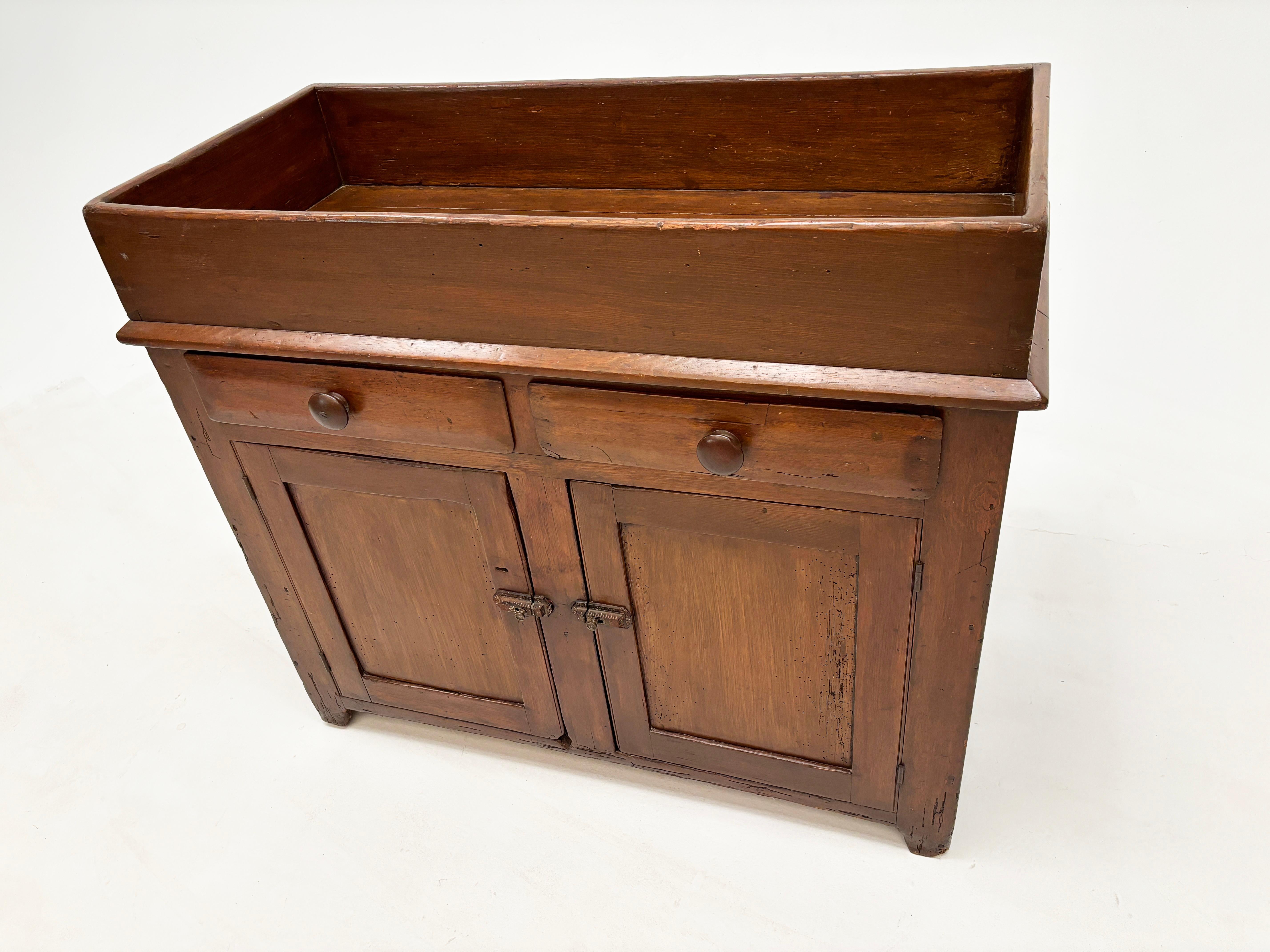 Summers in the early 1800’s in the Blue Grass of Kentucky might have included an afternoon spent washing pots and pans in this dry sink found in the summer kitchen, or cleaning up after a meal out in the side yard under an old tree.   Oh the stories