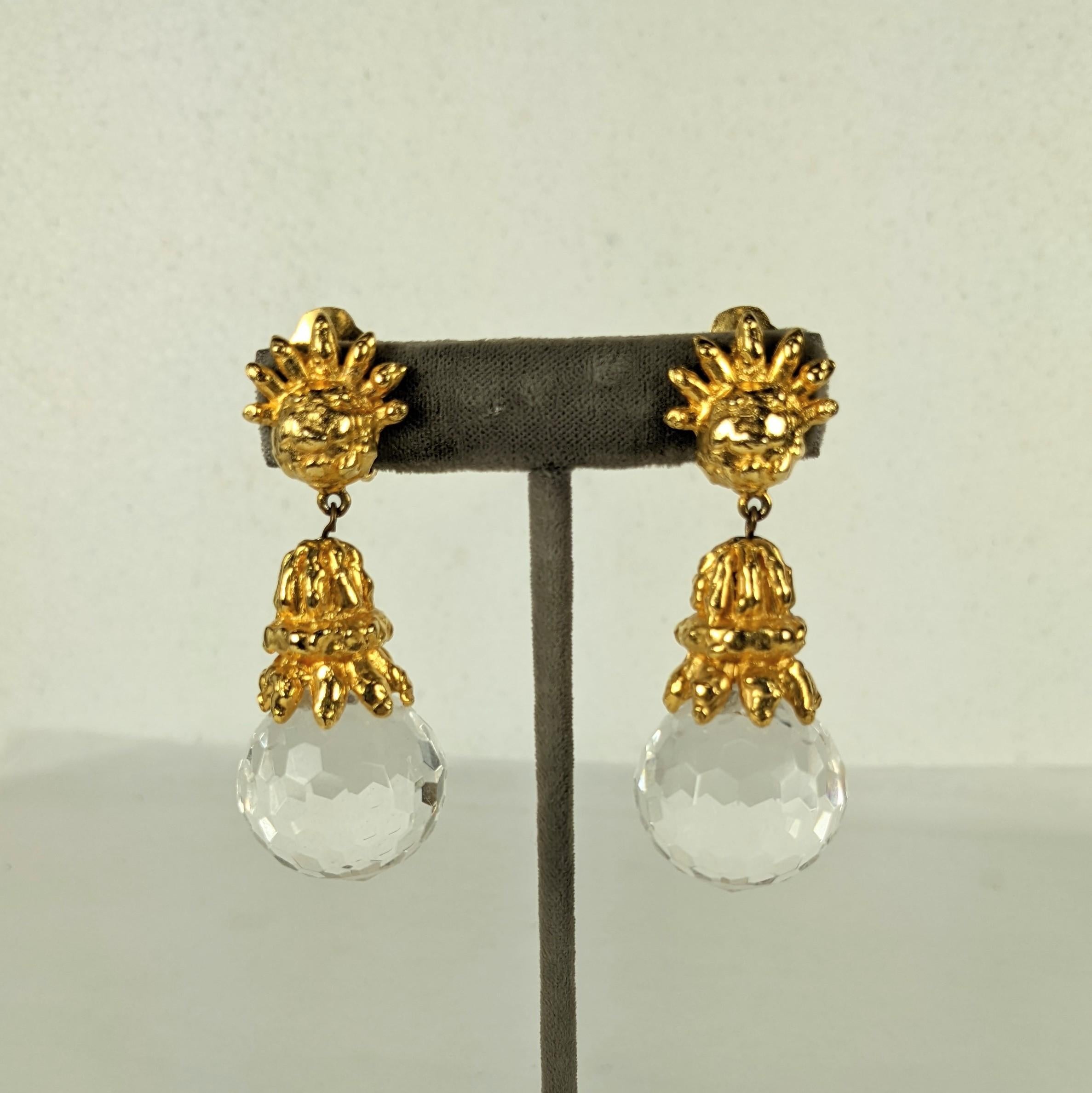 Attractive Early K.J.L. Hammered Gold and Crystal Earrings from the 1960's. Large scale clip earrings in gilt metal and faceted lucite made to replicate the David webb style. Wearable weight with impressive scale. 
Signed K.J.L. early mark.   1960's