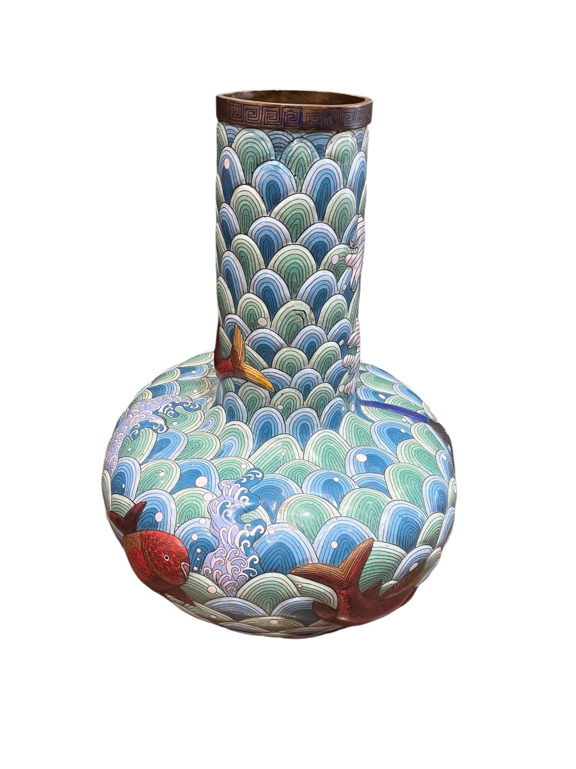 A beautiful early Japanese Cloisonne with very vibrant colors.  A very rare and unusual example from the period. A unique design with colorful Koi swimming in the bubble water. An exceptional feature of this piece is the raised enamel is in a