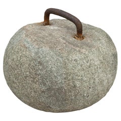 Grande pierre de curling ancienne à semelle unique avec poignée en forme de cerceau