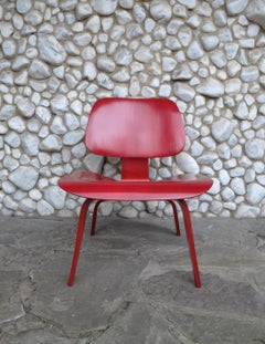 Early LCW Lounge Chair stained red by Charles & Ray Eames, Evans Plywood, 1950s