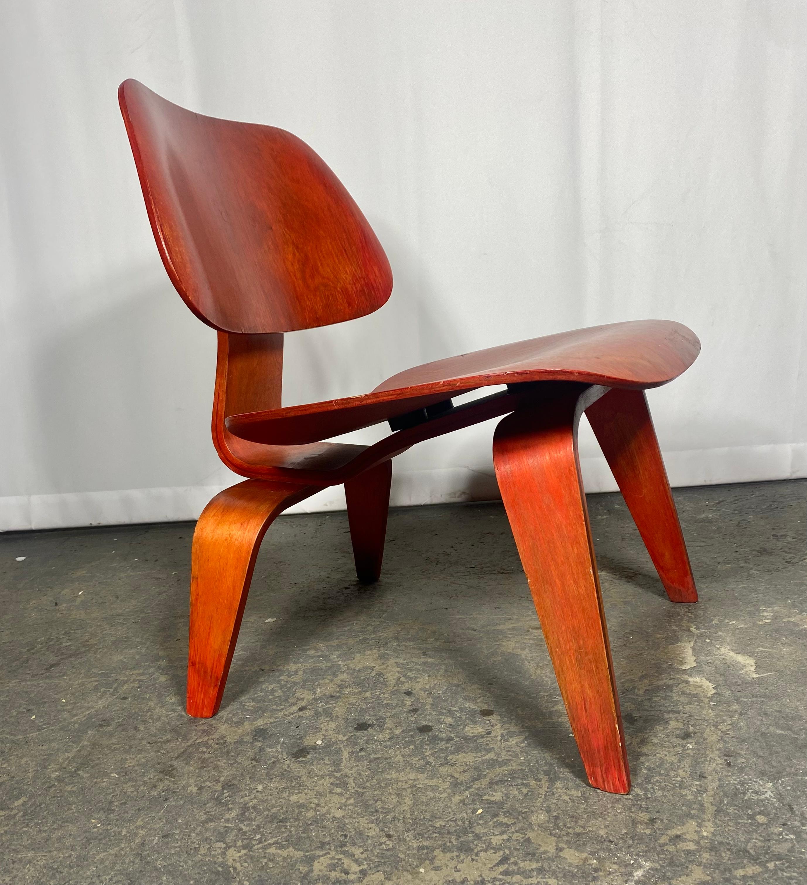 Dyed Early LCW Lounge Chair stained red by Charles & Ray Eames, Evans Plywood, 1950s For Sale