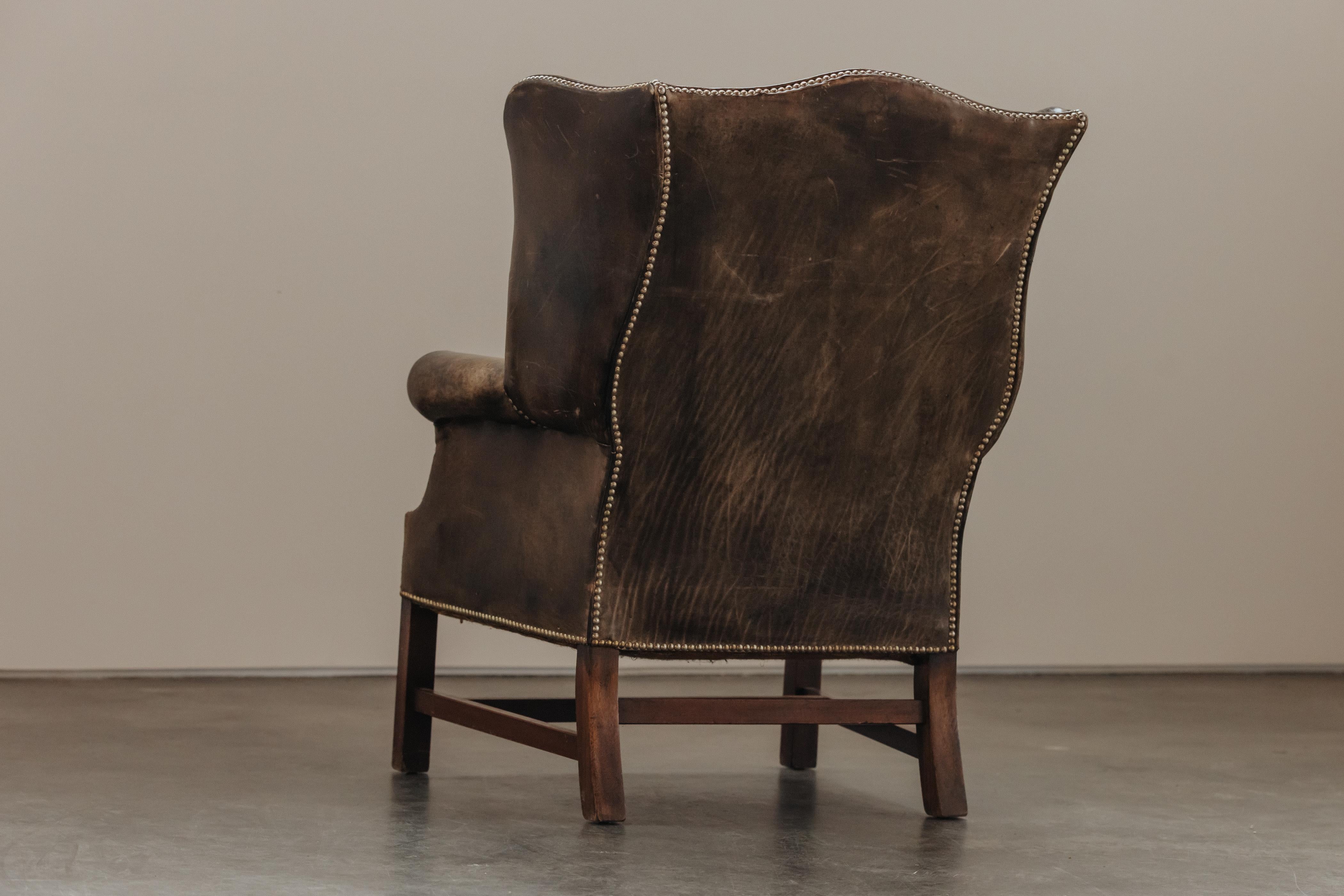 Sedia a dondolo in pelle proveniente dalla Francia, CIRCA 1950 in vendita 2