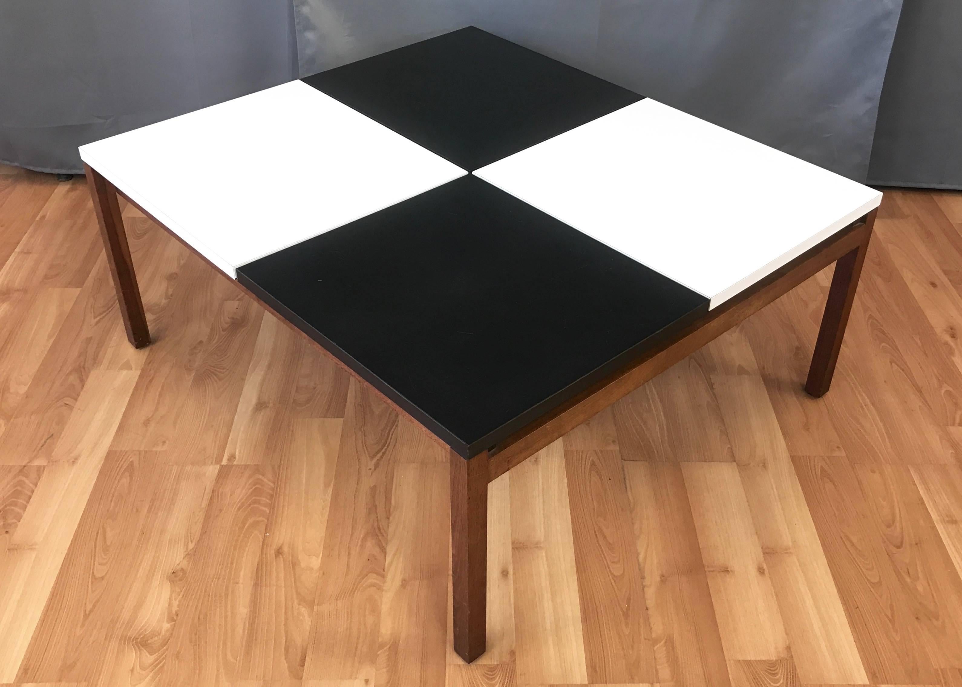An early 1950s example of Lewis Butler’s Model 350 checkerboard coffee table for Knoll Associates.

Rectangular black and white laminate top in four separate sections floats above solid walnut frame. Great visual impact with clean, geometric