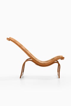 Chaise longue ancienne en bouleau teinté et toile de chanvre par Bruno Mathsson, 1936