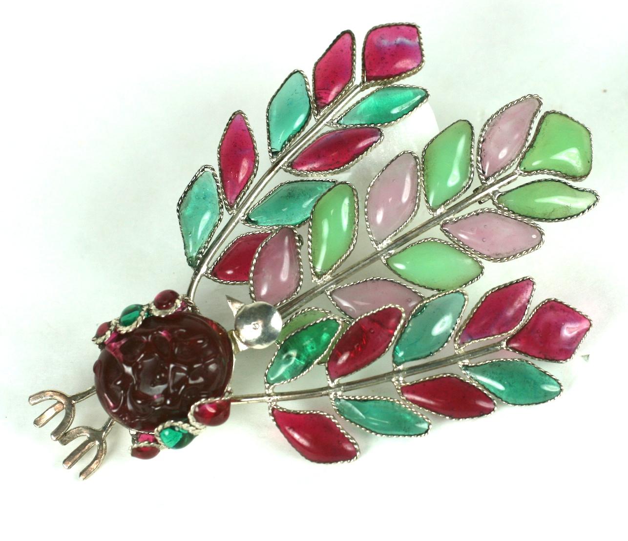 Early Maison Gripoix  Anglo Indian Peacock brooch. A rare 1930s Collectors piece of amythest, emerald, ruby, jade,and rose quartz poured glass enamel and lamp work focal cabochon. Fine wire work settings with early french plunger clasp.
Excellent