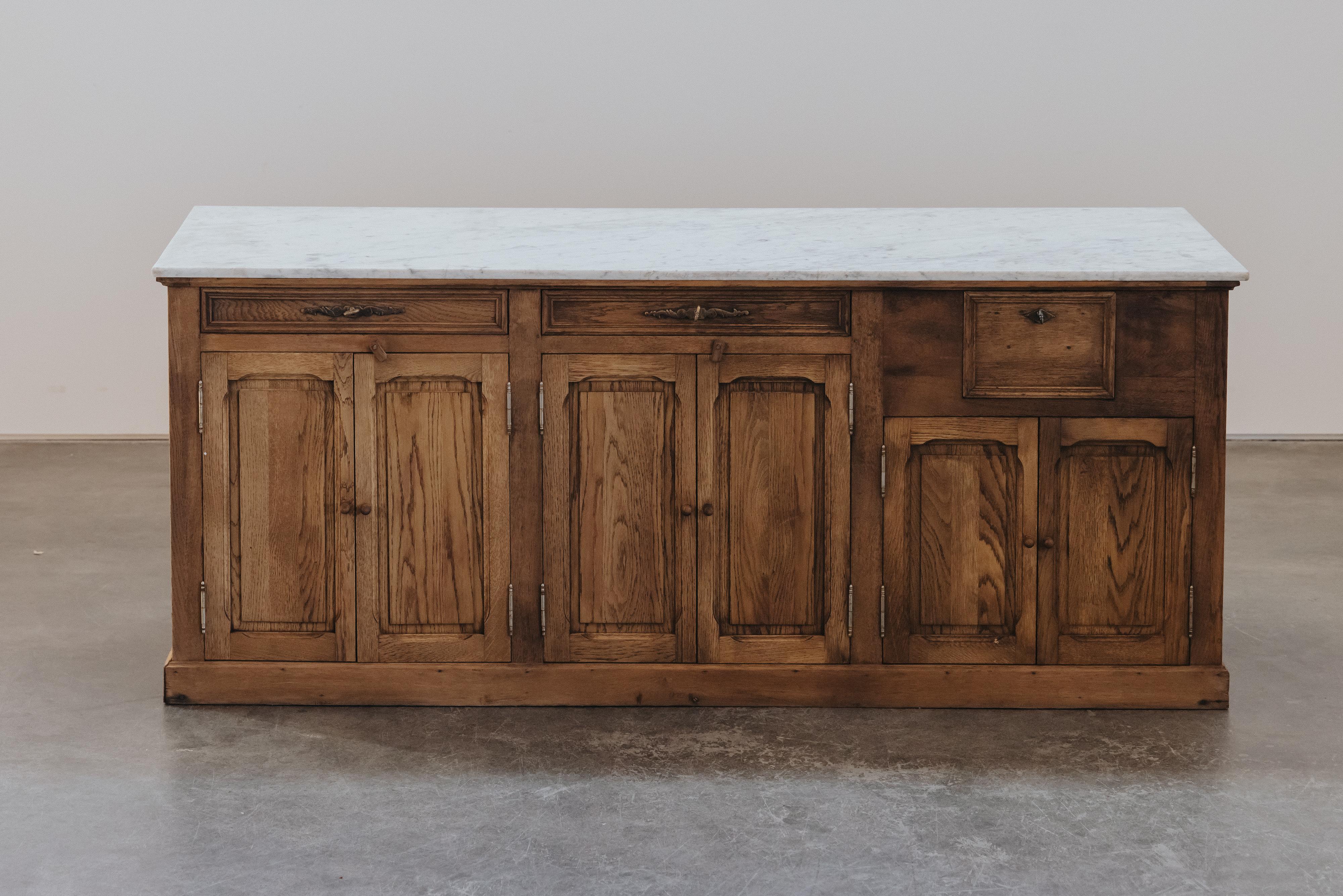 Early Marble and Oak Bakery Counter From France, Circa 1940.  Solid Marble top on an oak base.  Nice patina and use.