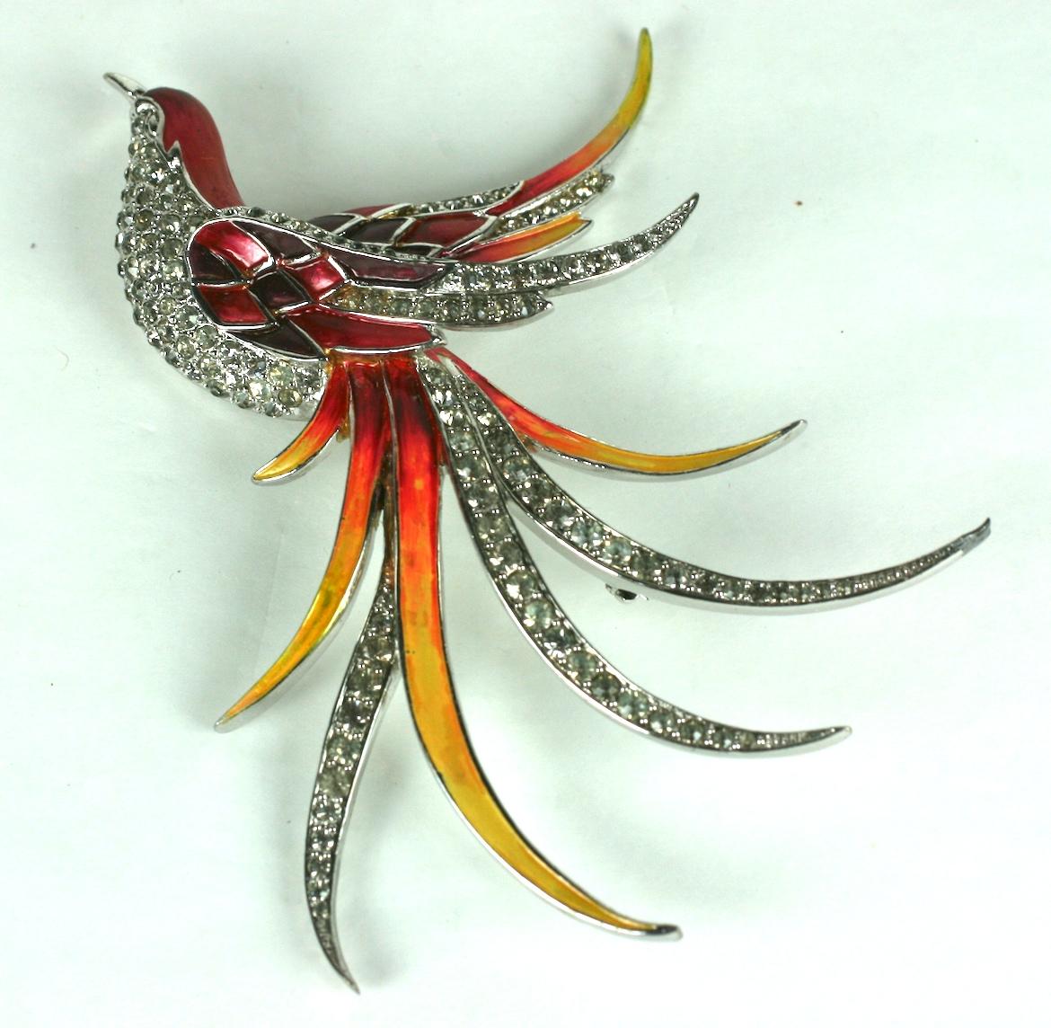 Rare, early Marcel Boucher Enamel Bird of Paradise from the 1930's. Enameled in tones of garnet red to firey orange with pave accents on the feathers.  1930's USA.  Rhodium finish. ORIGINAL enamel and signed 