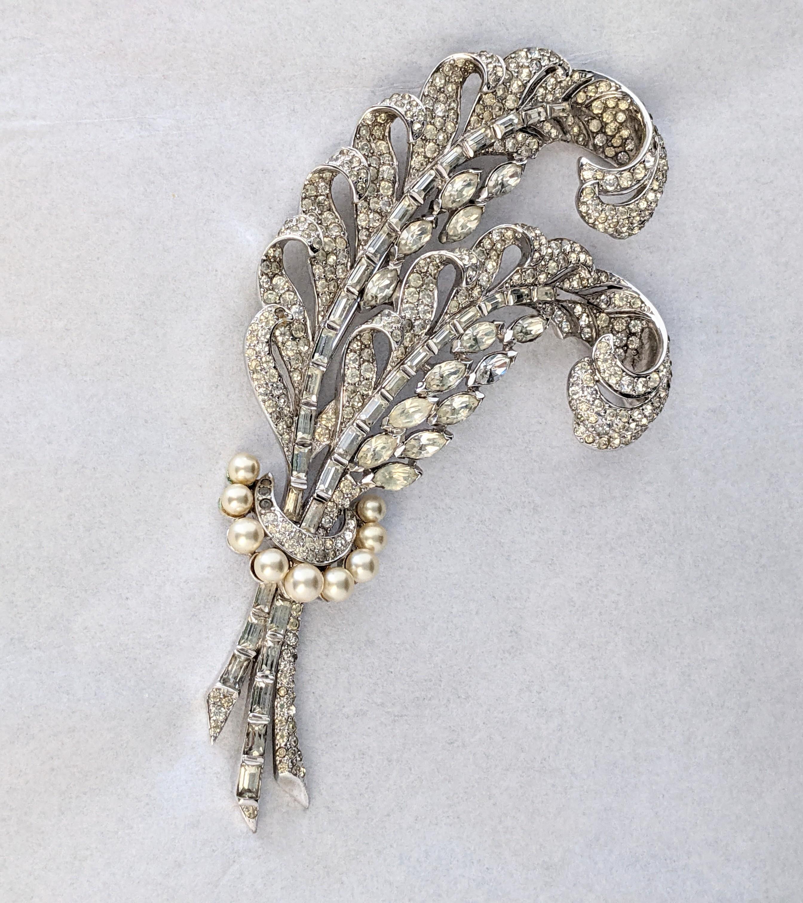 Magnificent, early Marcel Boucher Pave Feather Brooch of enormous scale from the 1930's. Beautifully detailed model with 3D pave work and graduated faux pearls. Based on 19th Century antique historical models but made for a 1930's clientelle. 