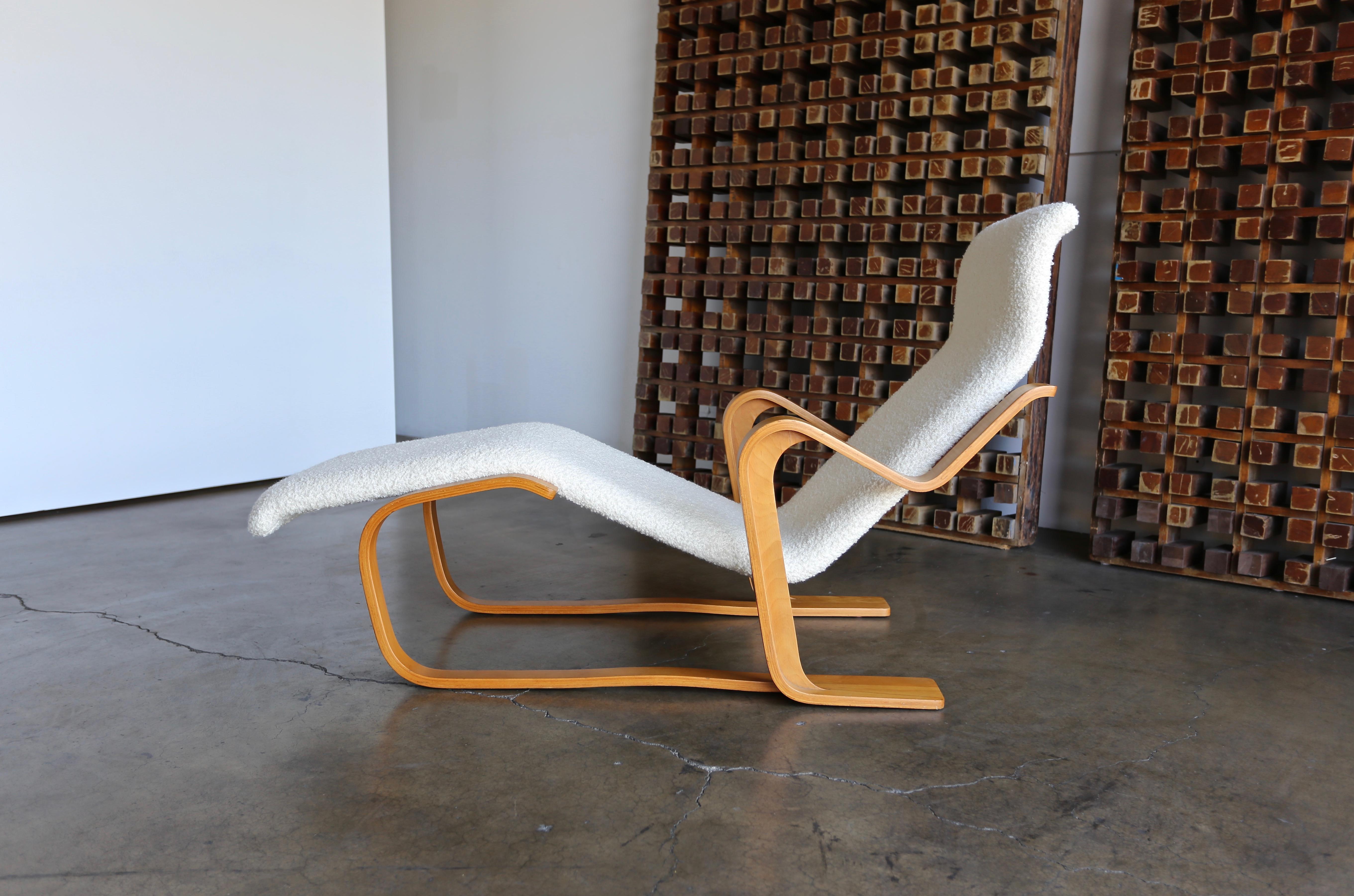 Early Marcel Breuer long chaise. This piece has been upholstered in a nubby cream colored bouclé.