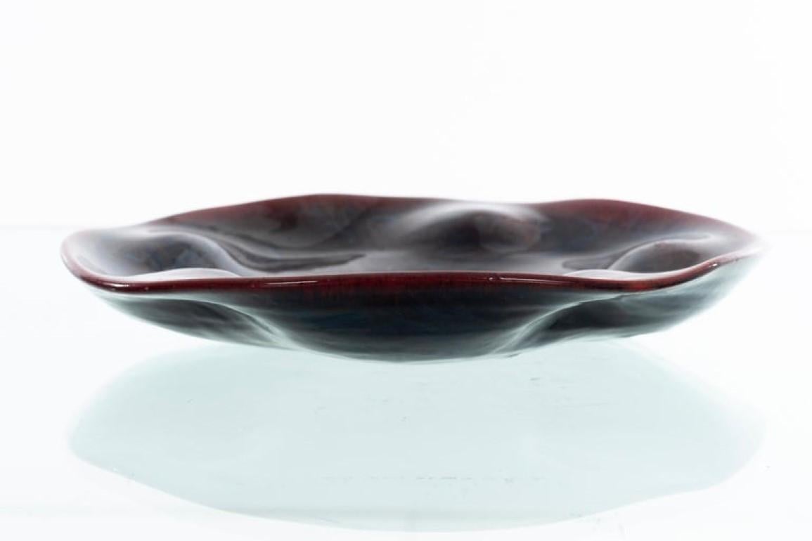 Early Marcello Fantoni platter, unusual waved design with deep glazes.
[Signed underside Fantoni made Italy with image].
