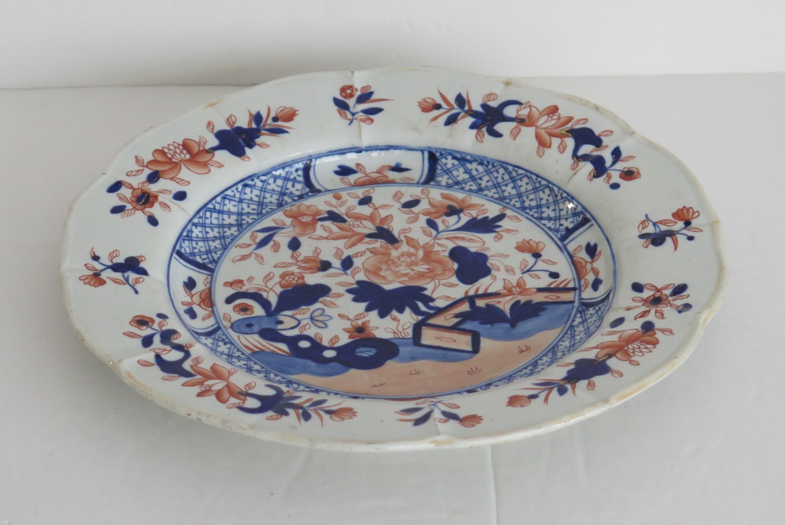 This is a good decorative Ironstone pottery desert plate or dish produced by the Mason's factory at Lane Delph, Staffordshire, England, circa 1815.

The plate is circular with radial ribs and a lobed rim.

This desert plate is beautifully