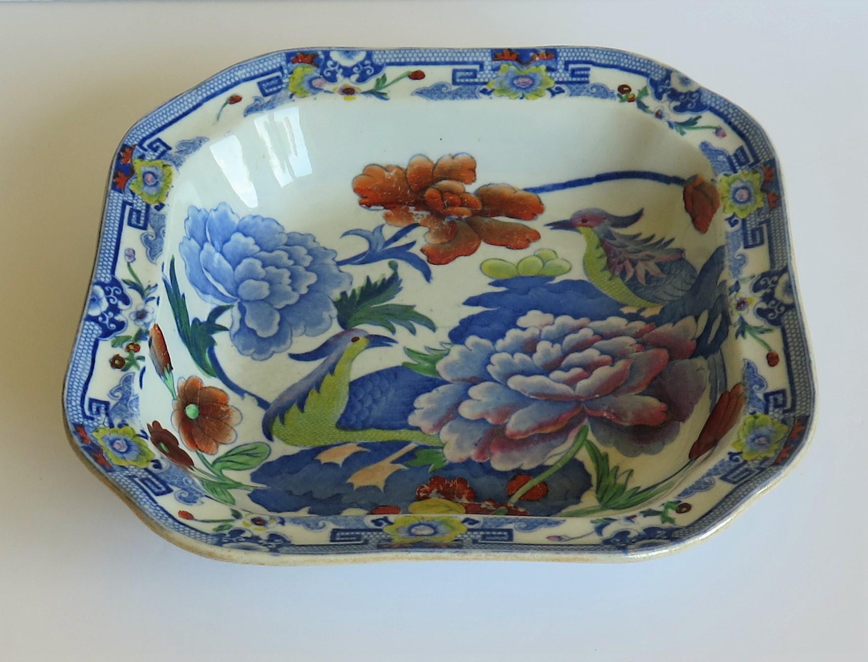 This is a very good large bowl or dish made by Mason's Ironstone, England in the early 19th century, circa 1815-1820.

Early Mason's bowls of this size and shape tend to be rare.

The bowl is nominally square with an everted rim and canted corners.