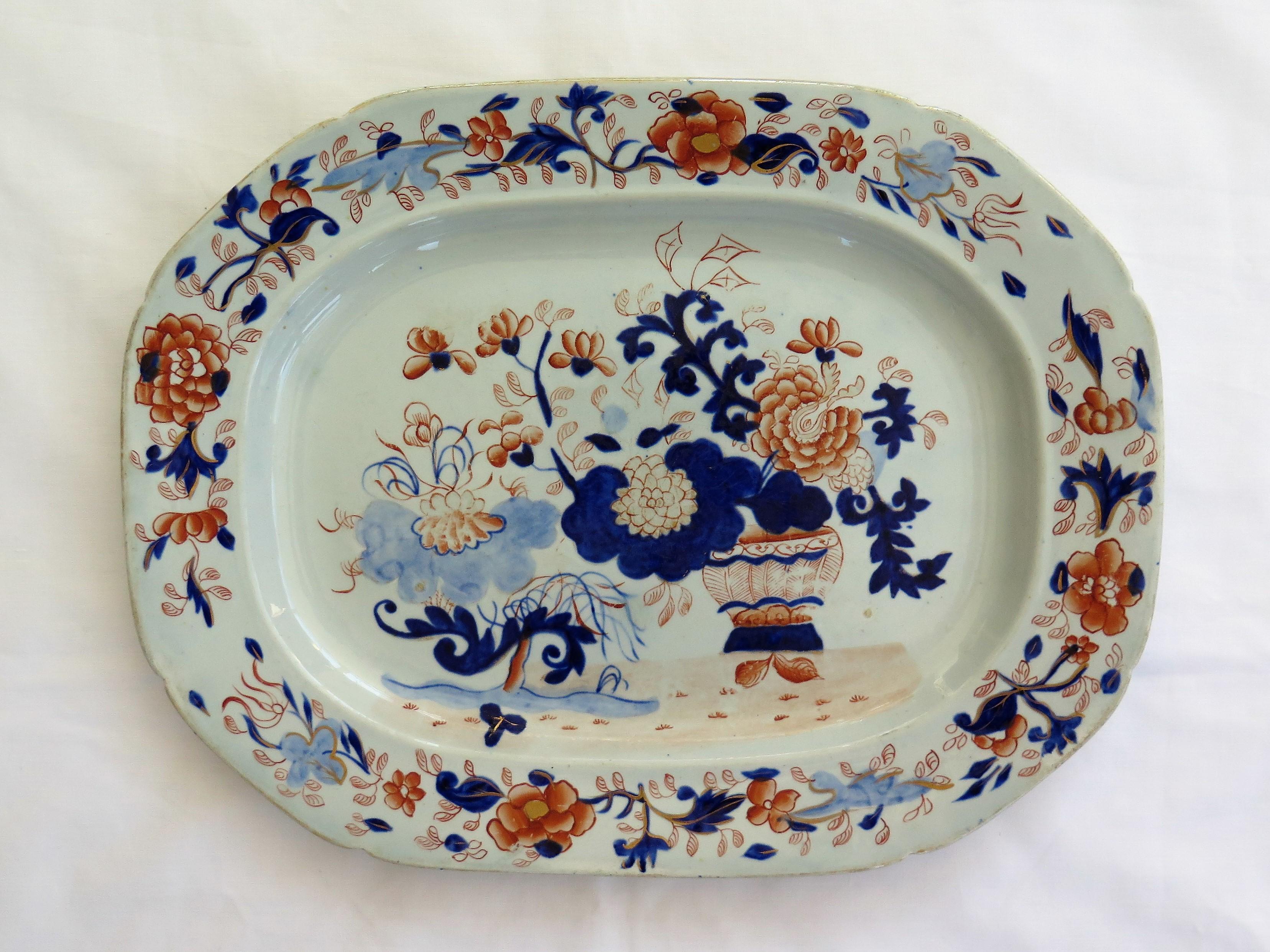 This is a very early large platter or meat plate in the Japan basket pattern by Mason's Ironstone, Lane Delph, England, dating to circa 1815.

The piece is potted as a large rectangular plate having octagonal sides with a notched rim.

The
