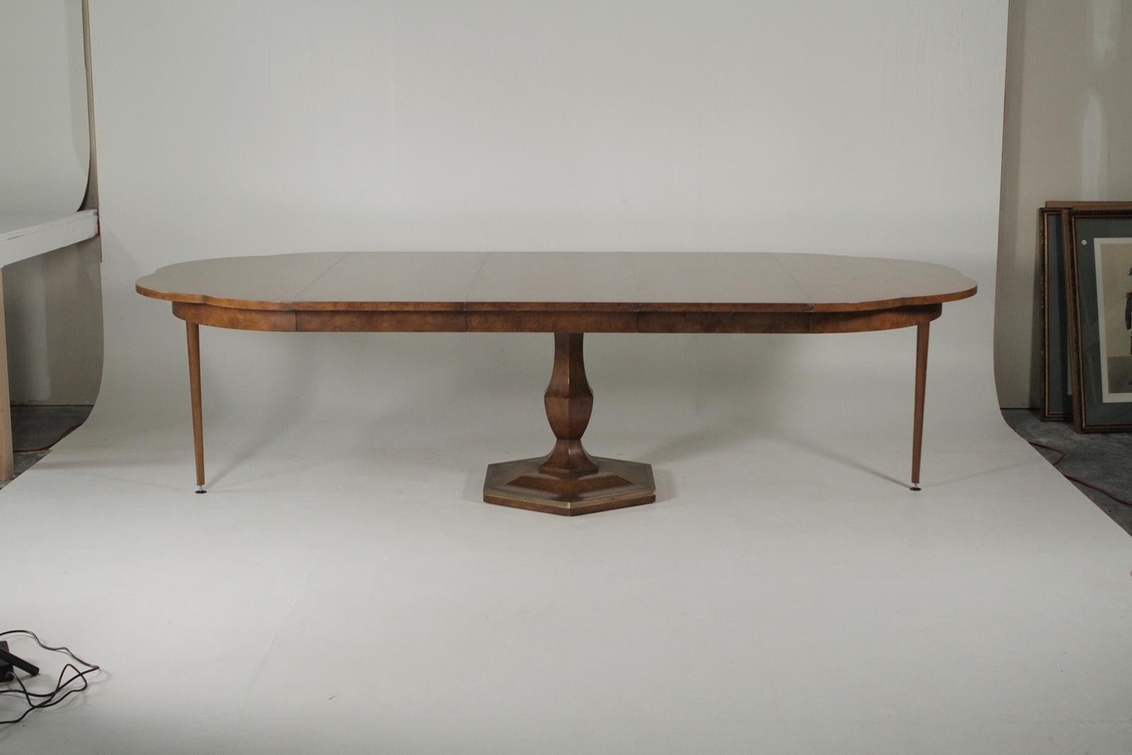 Early Mastercaft burl elm clover leaf dining room table with three Leaves. This chic style table is 48