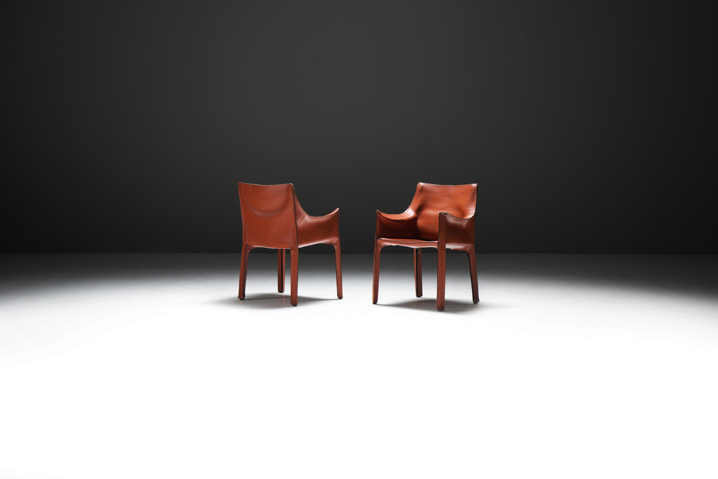Cab 413 Armchairs by Mario Bellini for Cassina, 1979 – Matching Early Edition Set in Rich Burgundy Leather
Iconic Free-Standing Saddle Leather Armchairs with Sculptural Elegance

Designed by the visionary Italian architect Mario Bellini in 1979, the