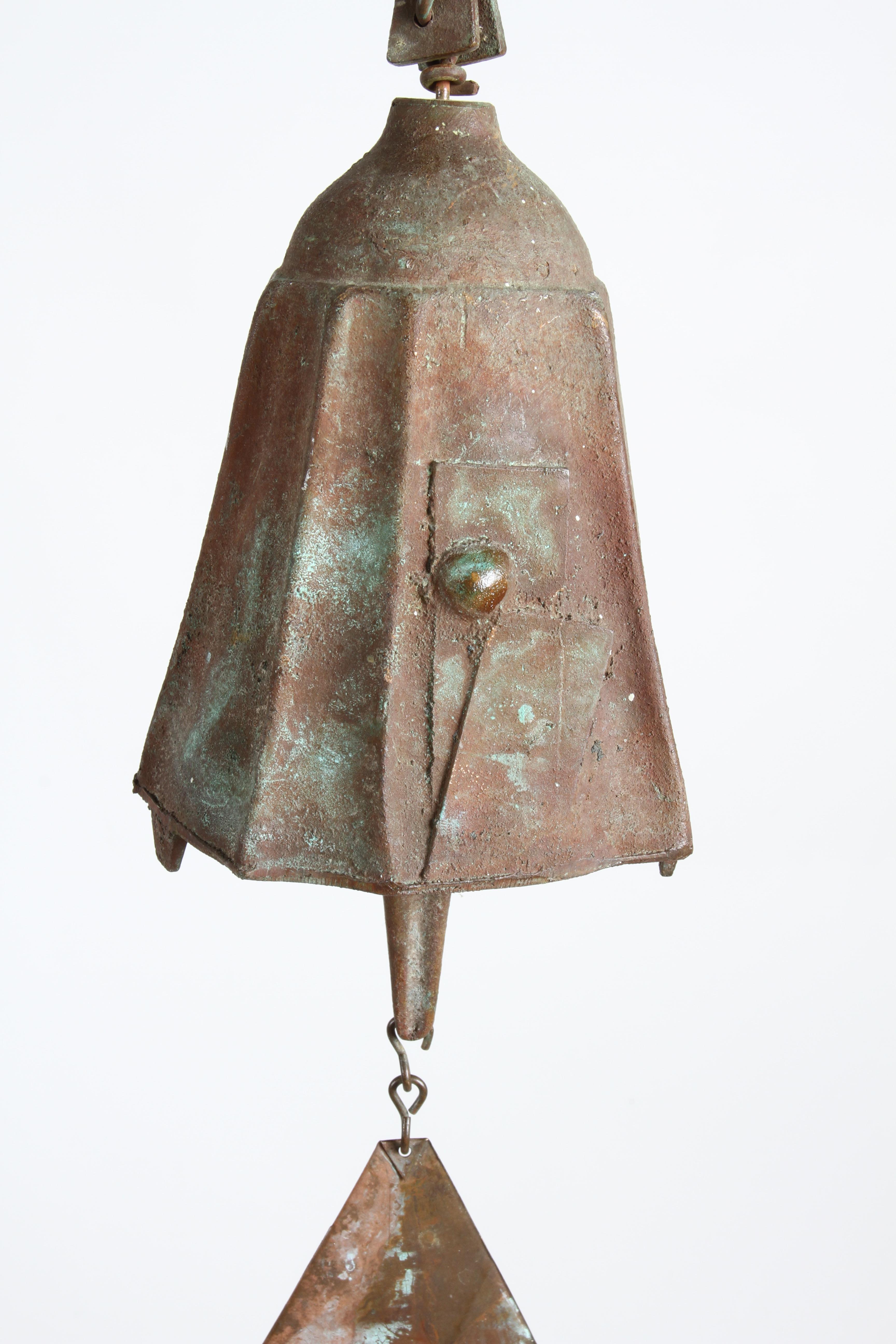 Early medium scale cast bronze sculptural wind chime or bell with patina by Italian-born visionary architect and artist, Paolo Soleri. This piece was made by the artist at his Cosanti studio in Arizona. Bell is 6.5