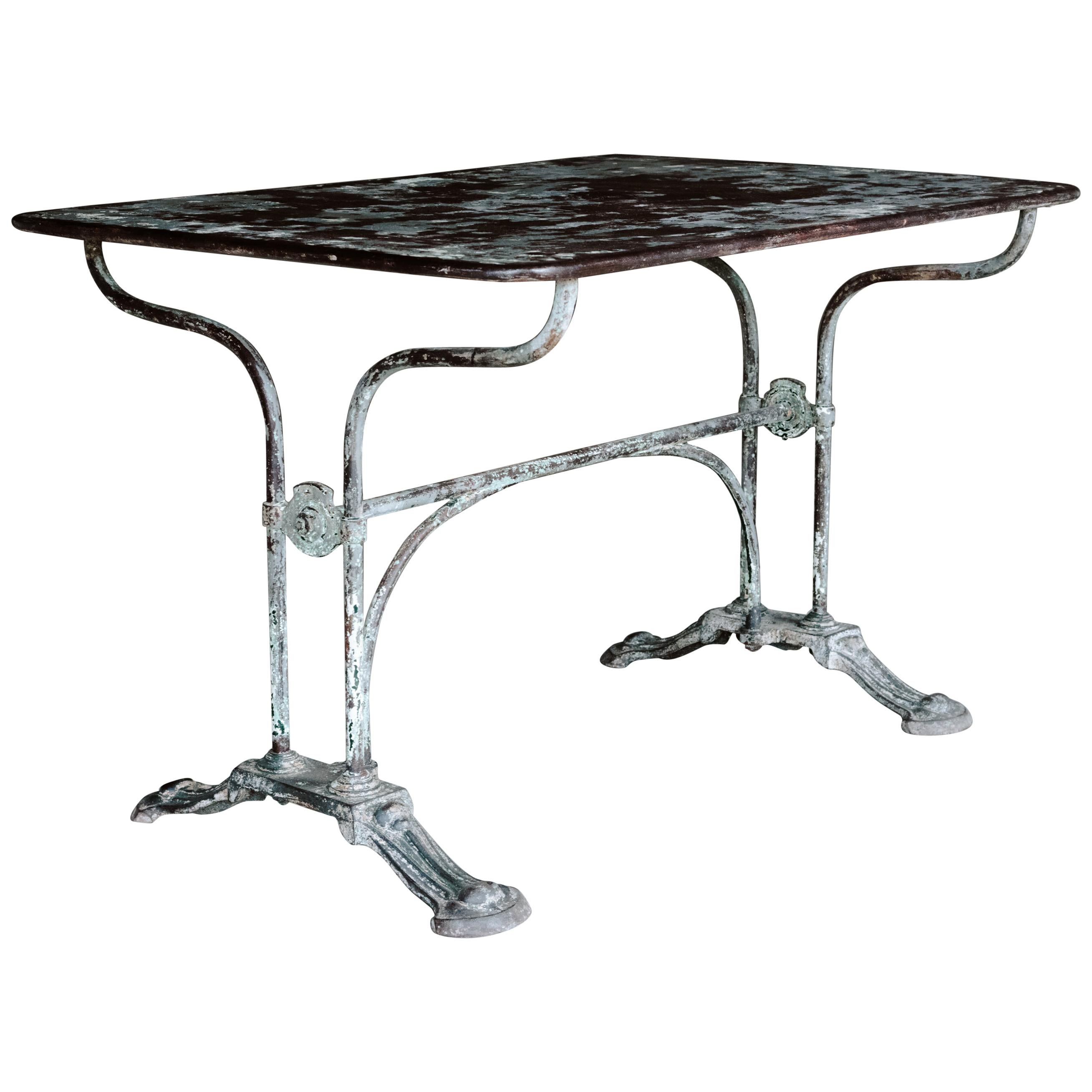 A French marble top bistro name with white iron base. circa 1930. at