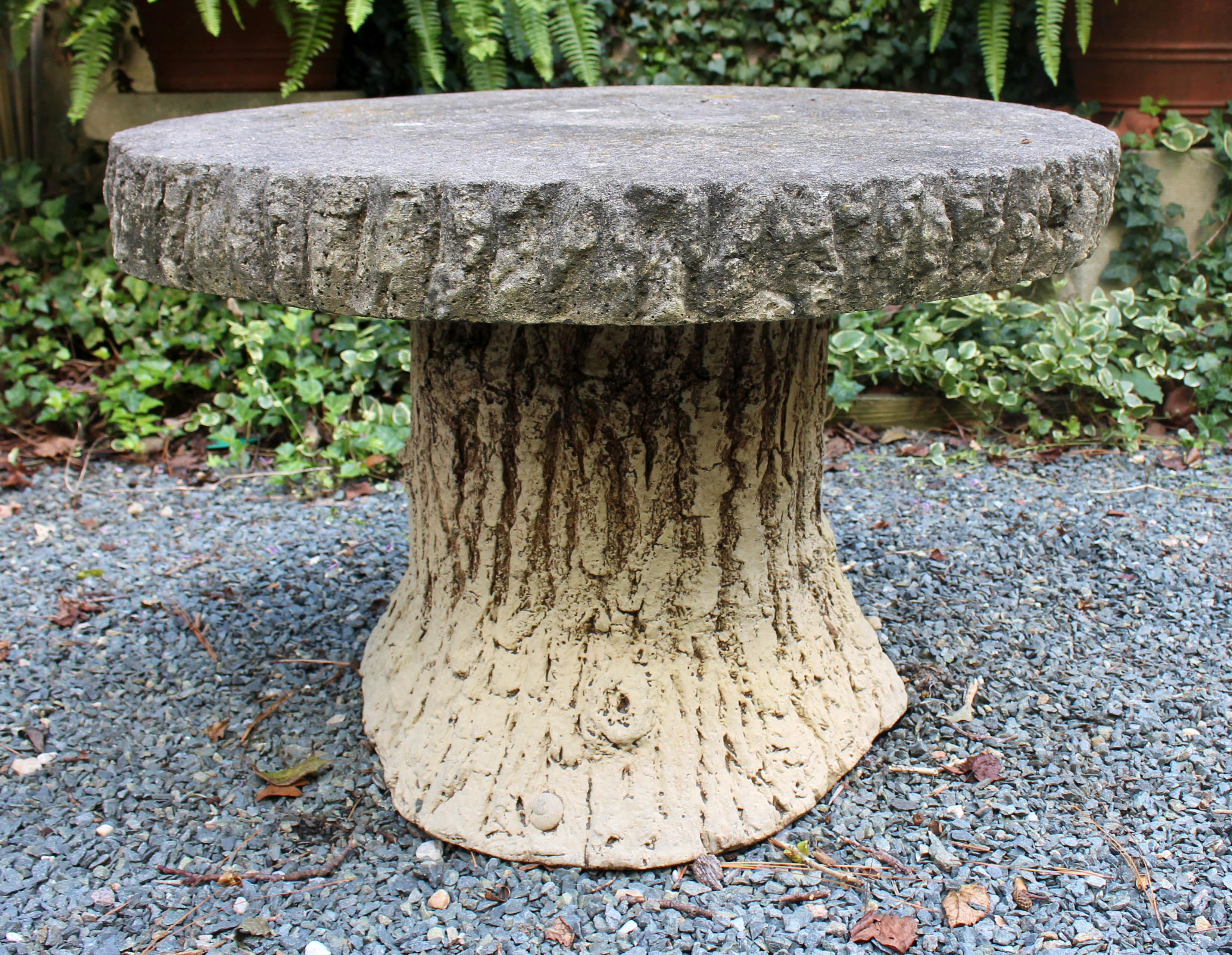 Cast Bath stone faux bois garden table, early-mid 20th century, English. From the Estate of Katharine Reid, former Director of the Cleveland Museum of Art.
30.5