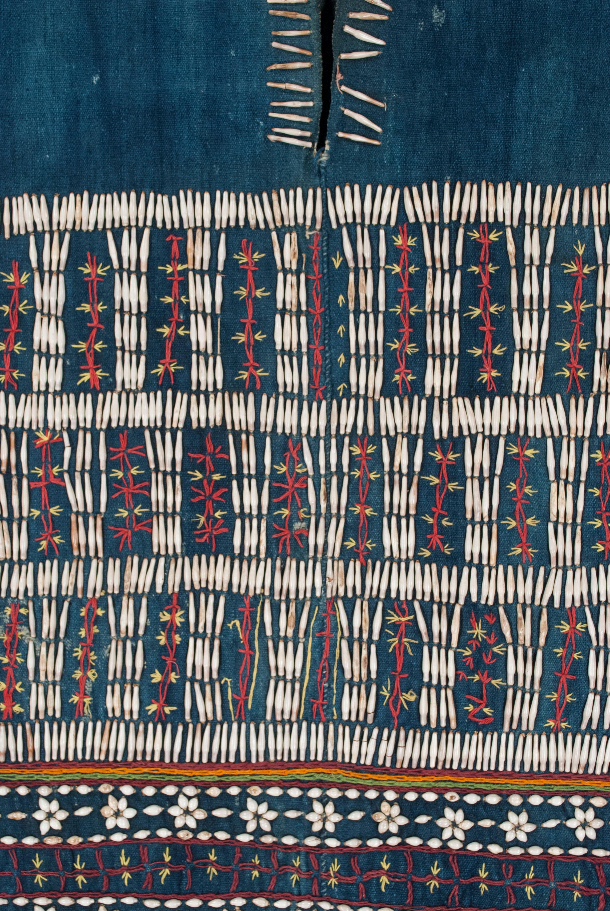 Early-mid 20th century Karen (Sgaw) women’s ceremonial tunic, Burma / Myanmar

Typically used in weddings and other formal occasions, woman’s tunics from the Sgaw Karen ethnic group in Burma were primarily decorated with applied Job’s tears on a