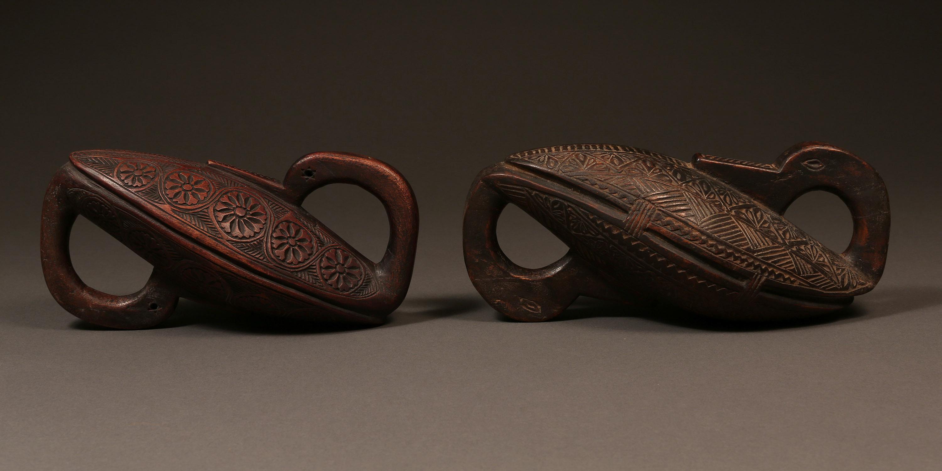 Pair of Carved Bird Motif Fastening Rings                                            
Middle Hills, Nepal                                                     
Early to mid-20th century                       
L: 9 in x H: 4.75 in D: 3.5 in   

A pair