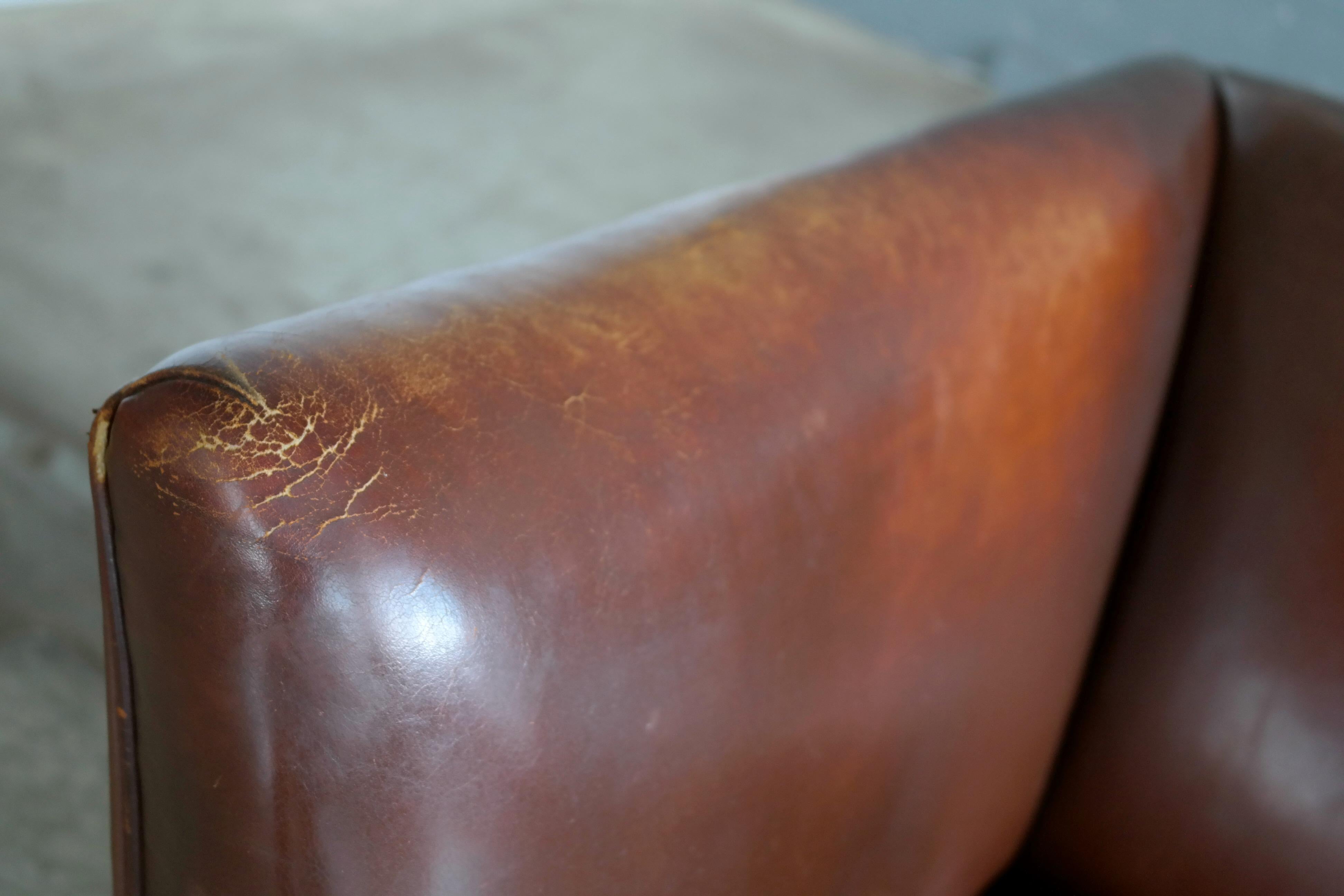 worn leather couches