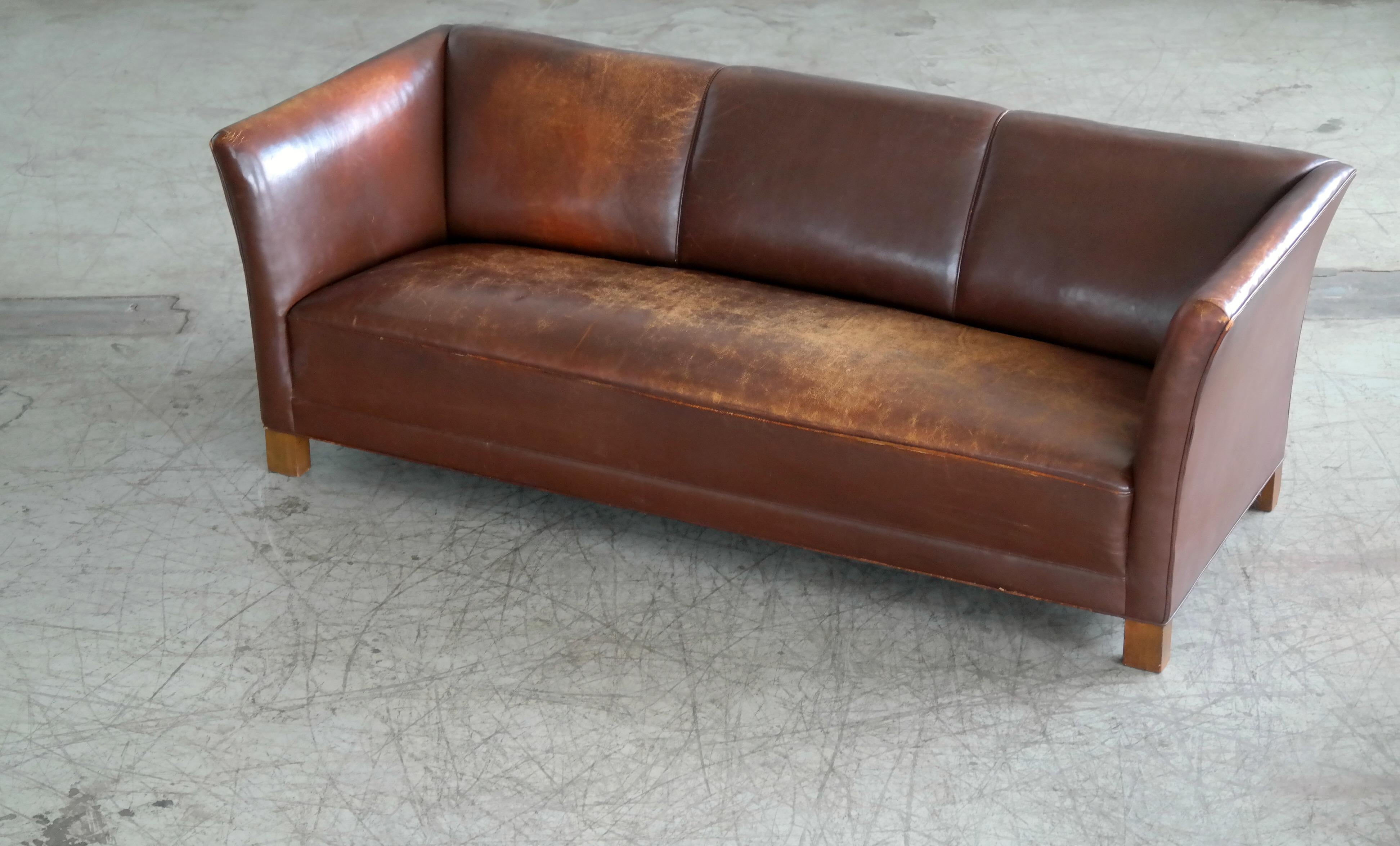 Early Midcentury Club Sofa by Fritz Hansen in Chestnut Brown Worn Leather In Good Condition In Bridgeport, CT