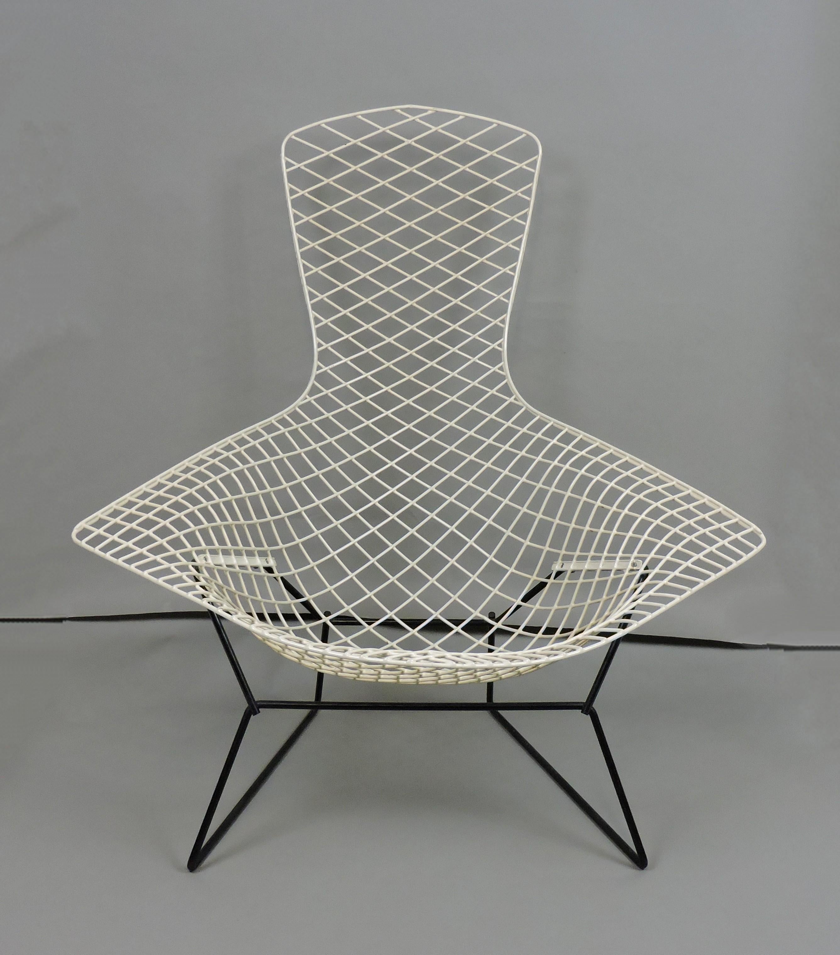 Early and unusual classic wire bird chair designed by Harry Bertoia and manufactured by Knoll. This chair dates to the mid 1950s, and is unusual as it was a special order and doesn't have the customary shock mounts, so there is no rocking motion.