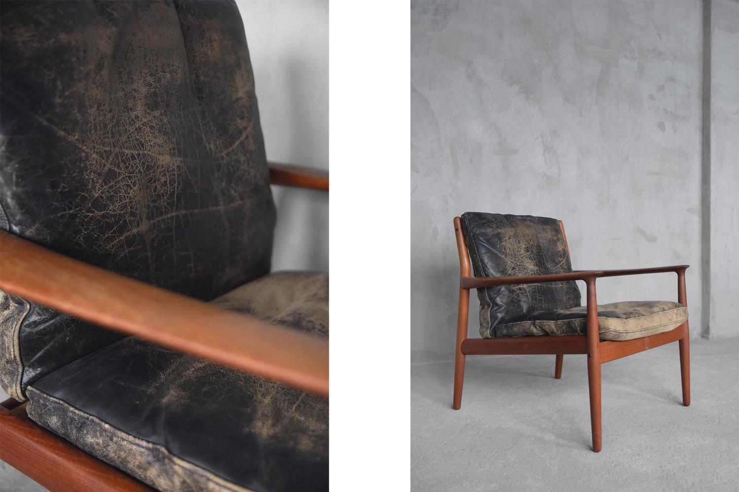 This elegant GM-5modernist armchair was designed by Svenda Åge Eriksen for the Danish manufacture Glostrup Møbelfabrik during the 1960s. This armchair comes from the first years of production. It has a solid teak frame (Bangkok Teak) and carved