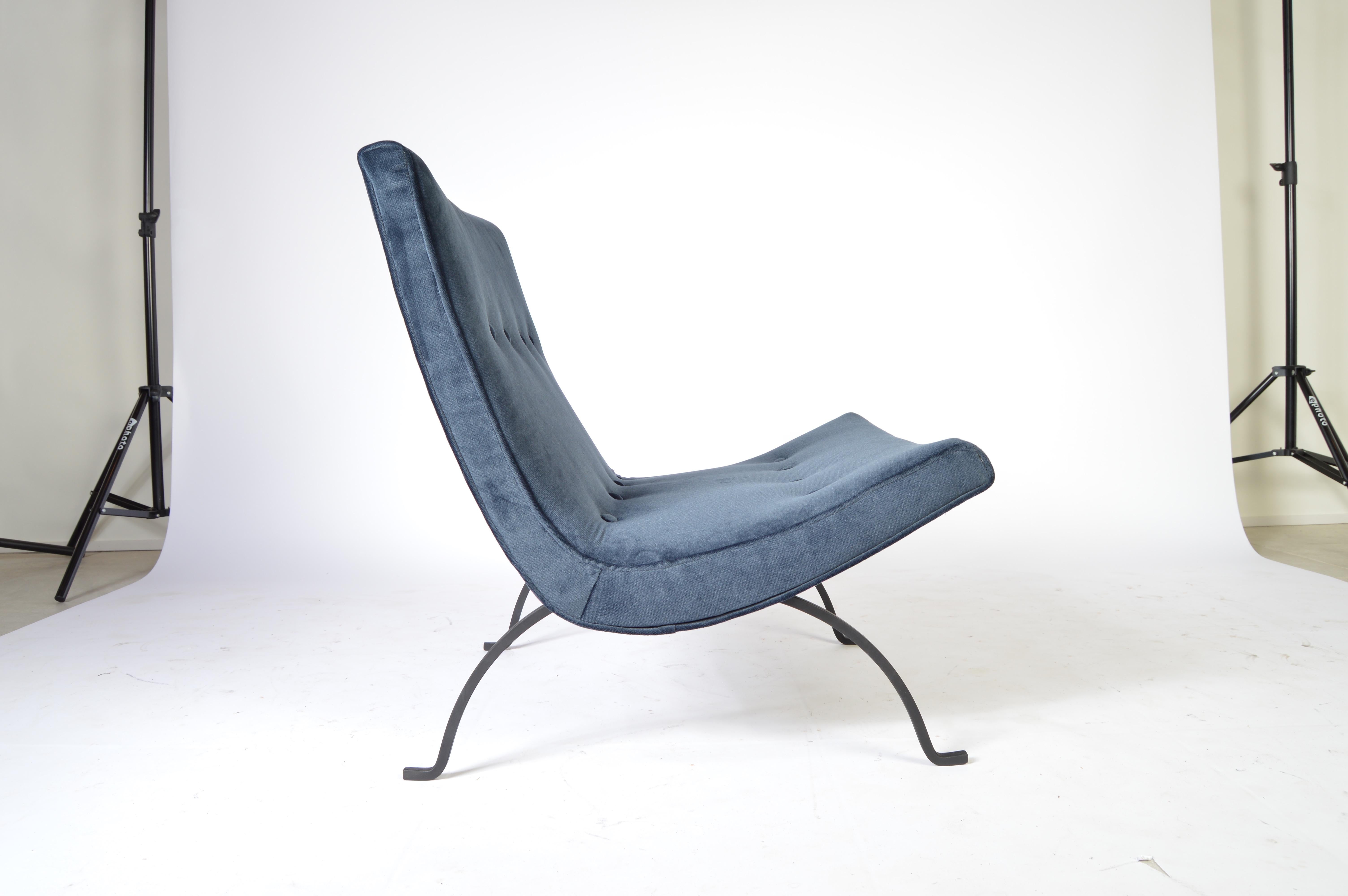 A 1950s scoop lounge chair designed by Milo Baughman having a black, solid iron frame and fresh velvet upholstery with new cushioning.