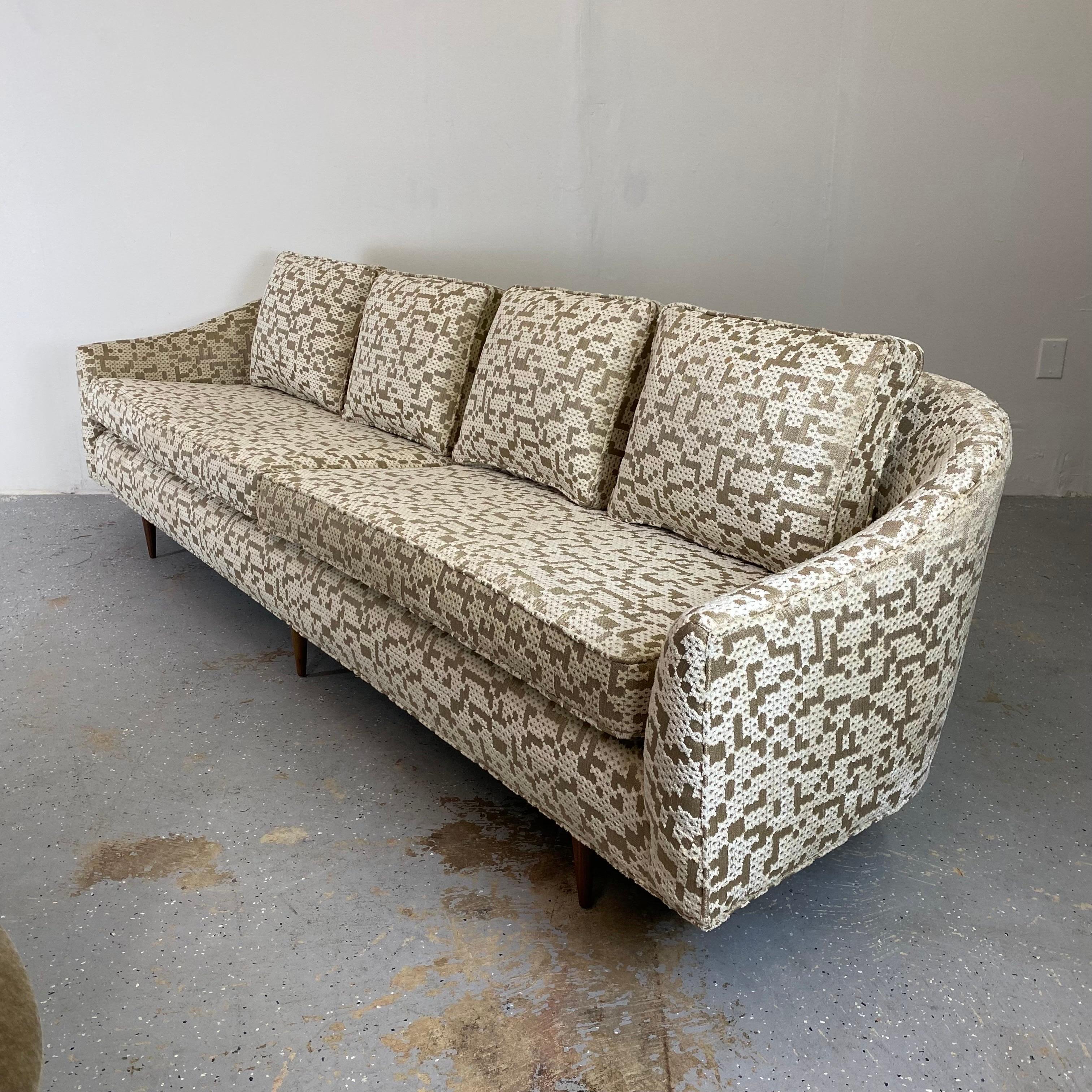 An early Milo Baughman sofa by Thayer Coggin, expertly restored.