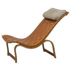 Early model 36 chaise longue by Bruno Mathsson, Leather and beech, 1940s