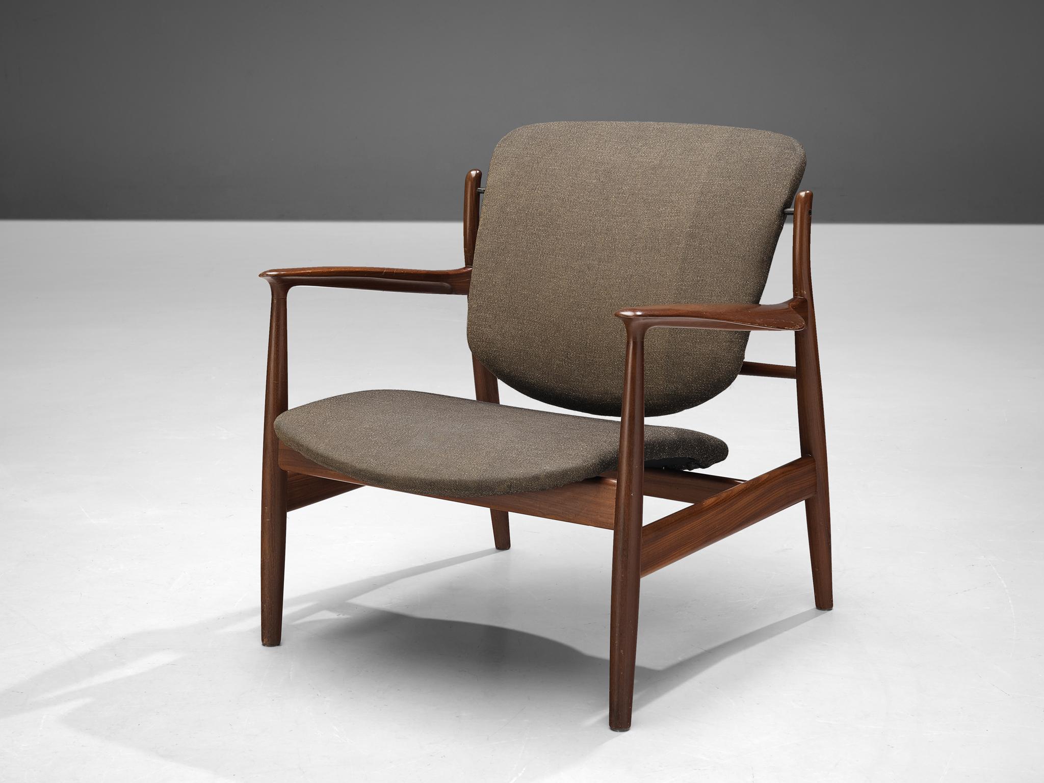 Finn Juhl for France & Søn, lounge chair early model '136', teak, fabric upholstery, Denmark, 1959. 

Very honest and open design by the Danish architect and designer Finn Juhl. As a lot of his designs, this chair as well shows its Danish origin