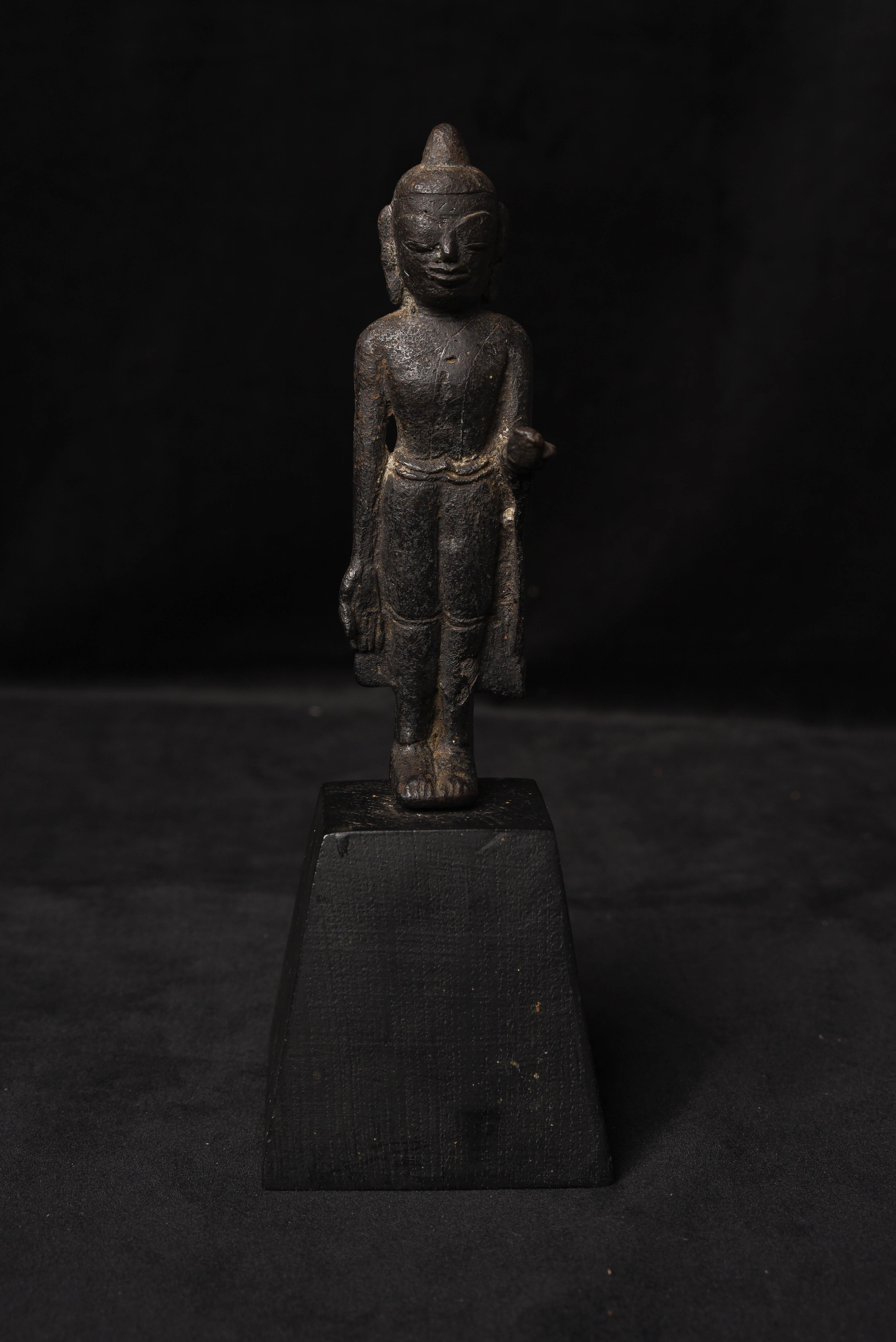 This is a very rare early Mon style solid cast iron standing Buddha from Burma, probably the 10th century. He is one of a kind- I’ve seen related pieces, but never another quite like this. Stands 6.5