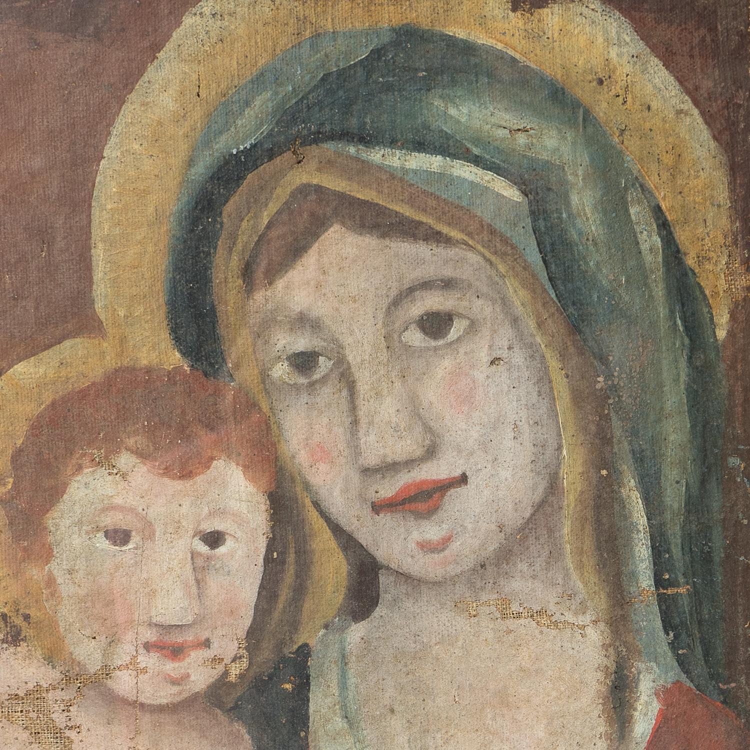 ANTIQUE ORIGINAL OIL ON CANVAS PORTRAIT PAINTING 

A charming folk art depiction of the Madonna and child. 

Probably continental in origin and dates from the 18th century. 

Framed and glazed in a later simple wooden frame. 

The heavy gauge canvas