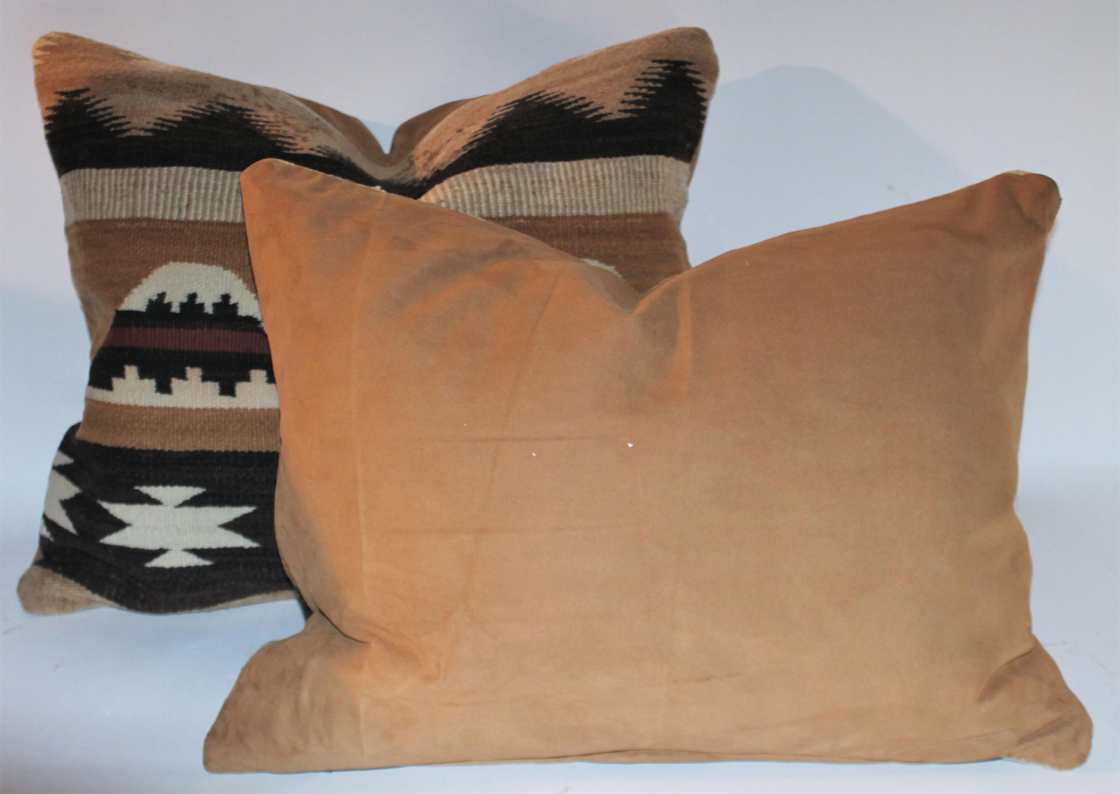 Early Navajo Chinle Indian weaving pillows with fantastic colors. The backing is in suede /leather. The condition is in very good. Sold as a pair.