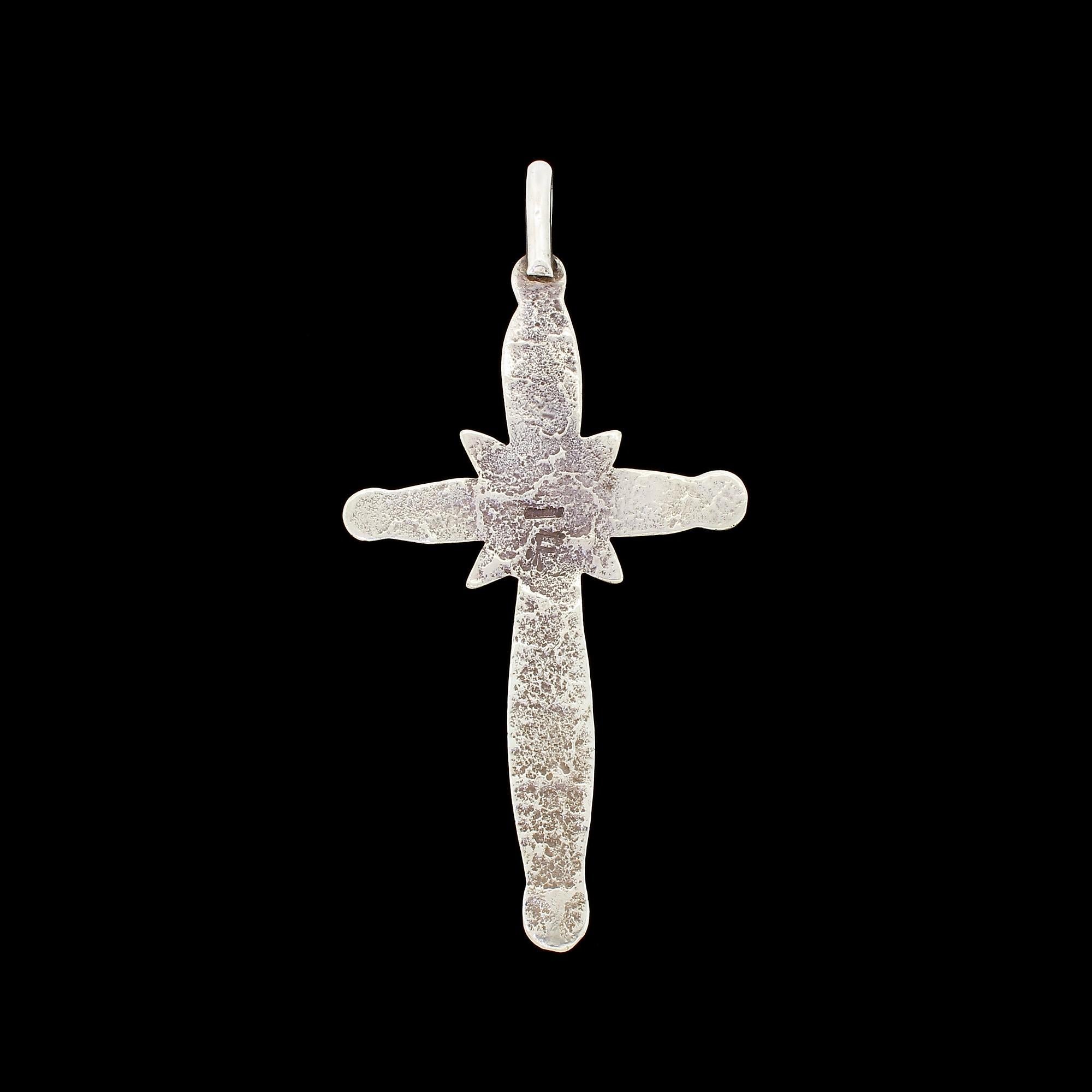 Outstanding and large early Navajo Indian sandcast cross pendant from the estate of a collector of unusual Native American silver. The front contains warm natural patina, and is smooth to the touch from years of handling and good construction. The