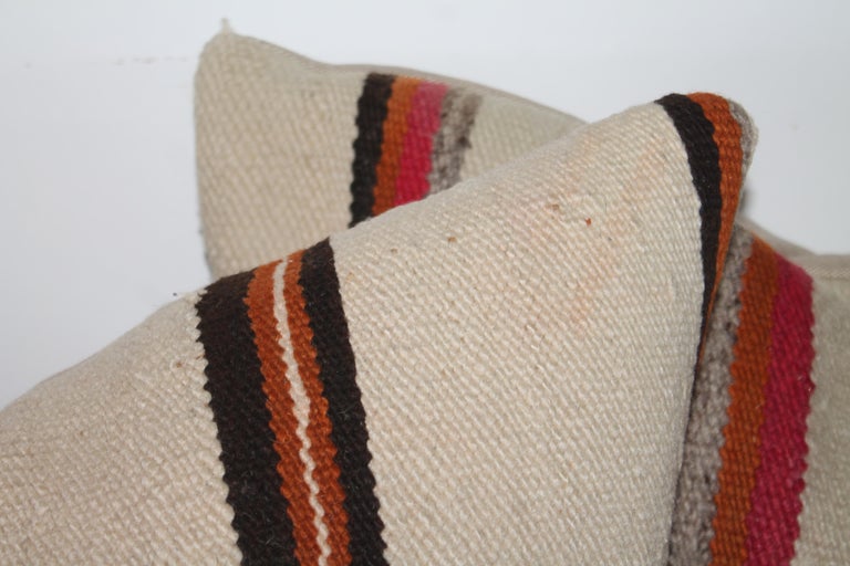 Hand-Woven Early Navajo Indian Weaving Saddle Blanket Pillows, Pair For Sale