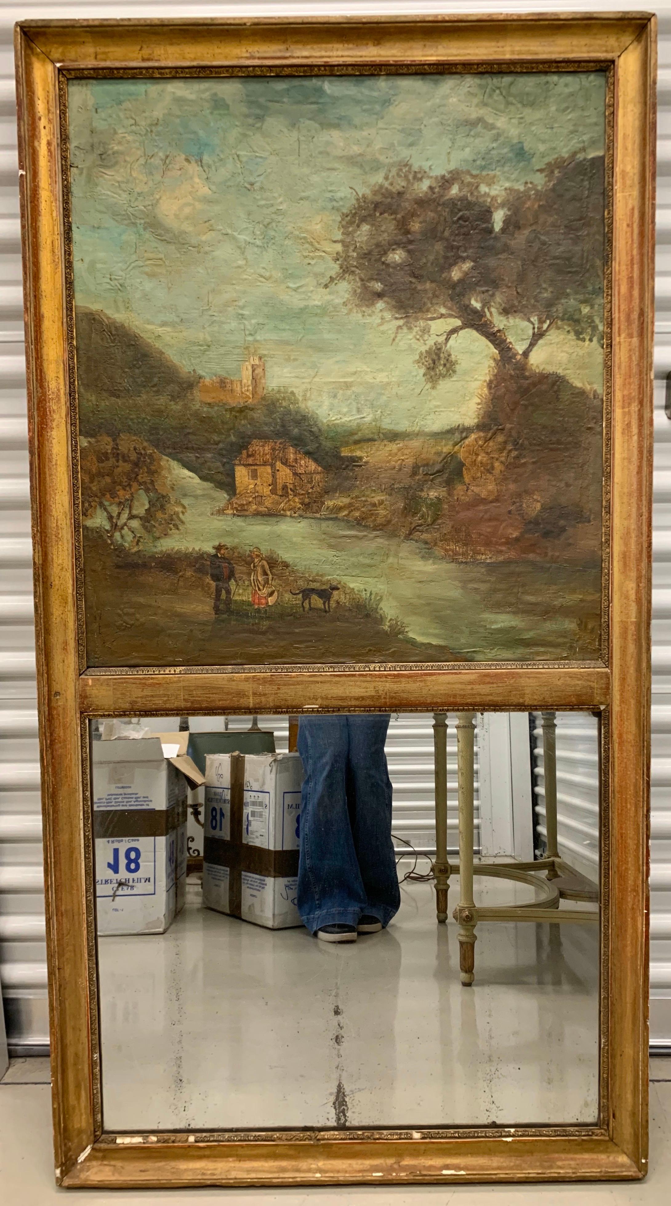 Stunning early 19th century French Trumeau antique giltwood mirror with original oil on canvas painting
of a landscape scene at top. The mirror has the perfect patina given its age and the painting is still in good condition with minimal flaws (see