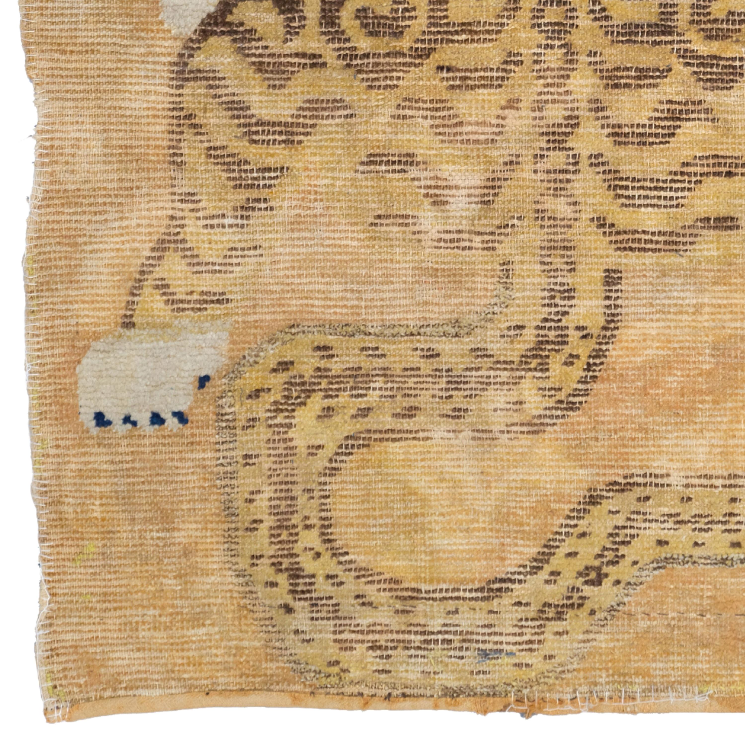 Tapis tigré Ning Xia ancien
Taille :138 x 72 cm (4' 6