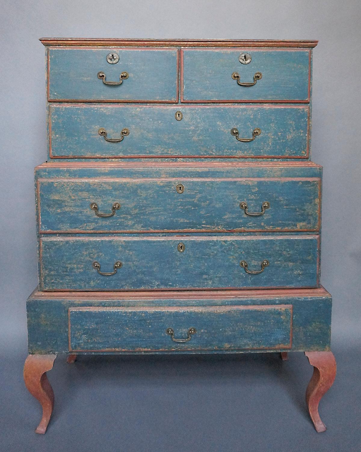 Magnificent 18th century chest on chest in original paint, Norway circa 1780. Constructed in three parts, the upper section has two drawers over one full-width drawer. The middle section has two wide drawers and sits on a separate base with a single